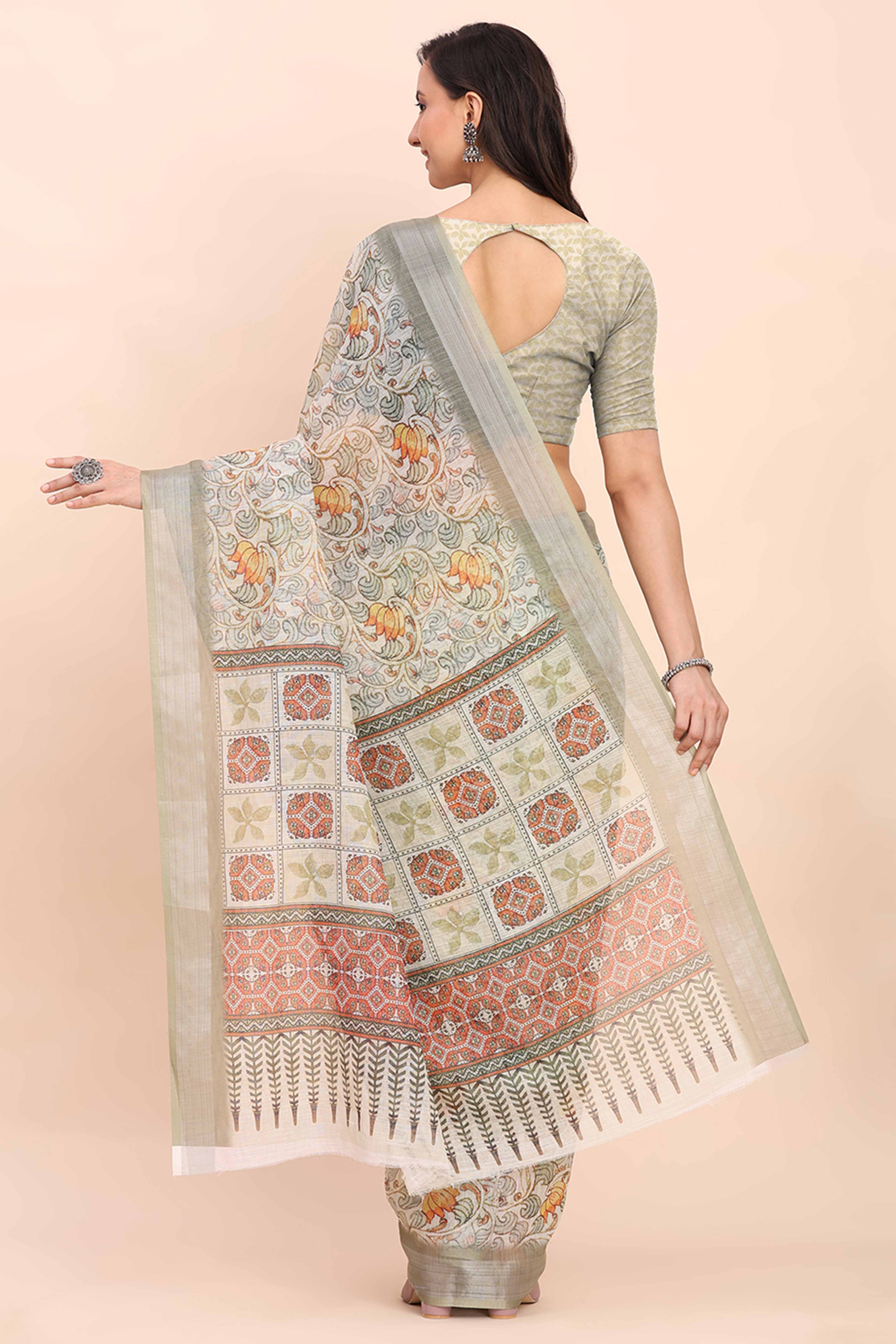 Light Green Linen Cotton Saree Featuring Floral Prints & Woven Border