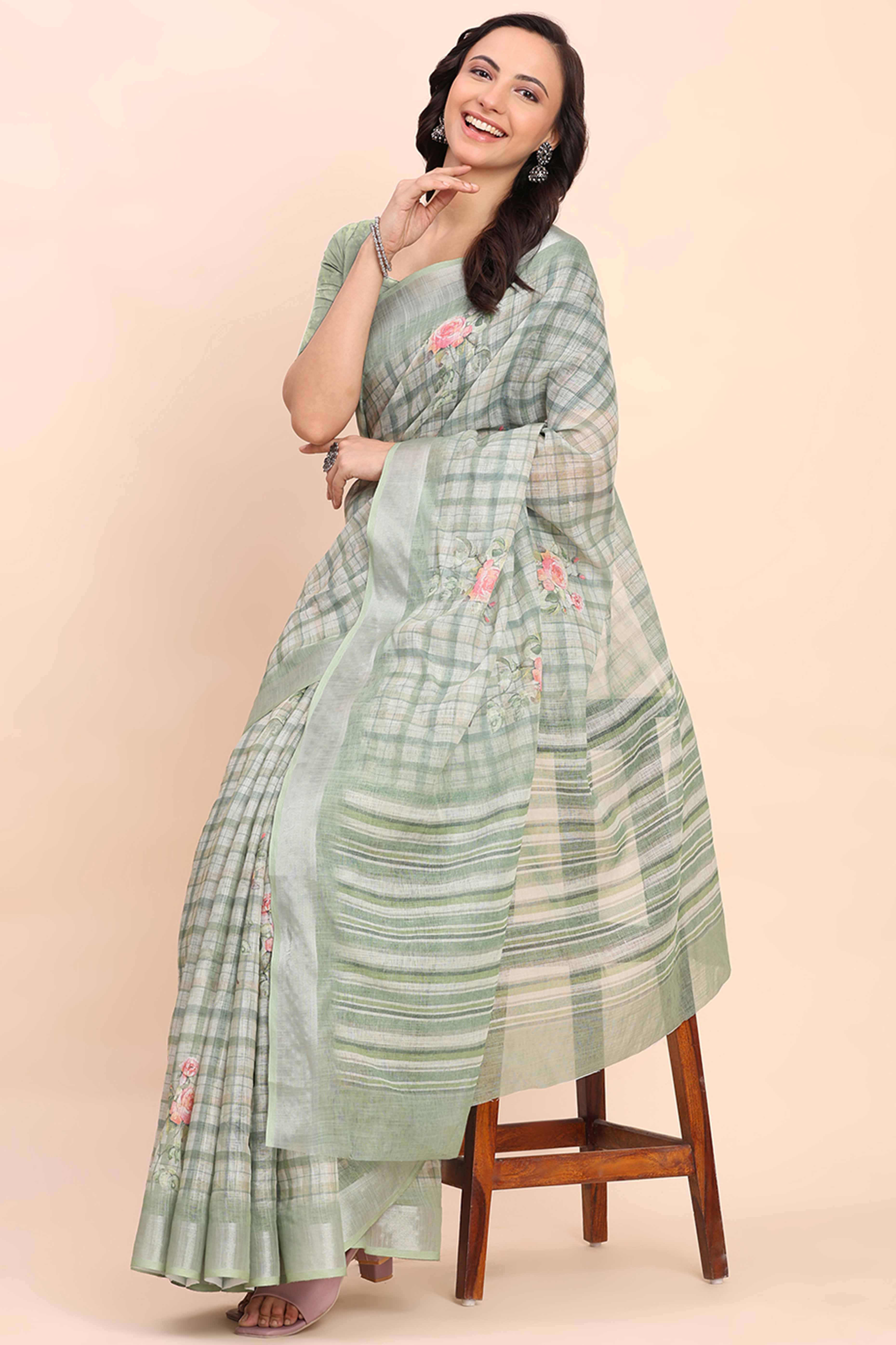 Sea Green Linen Cotton Saree Featuring Floral Prints & Woven Border