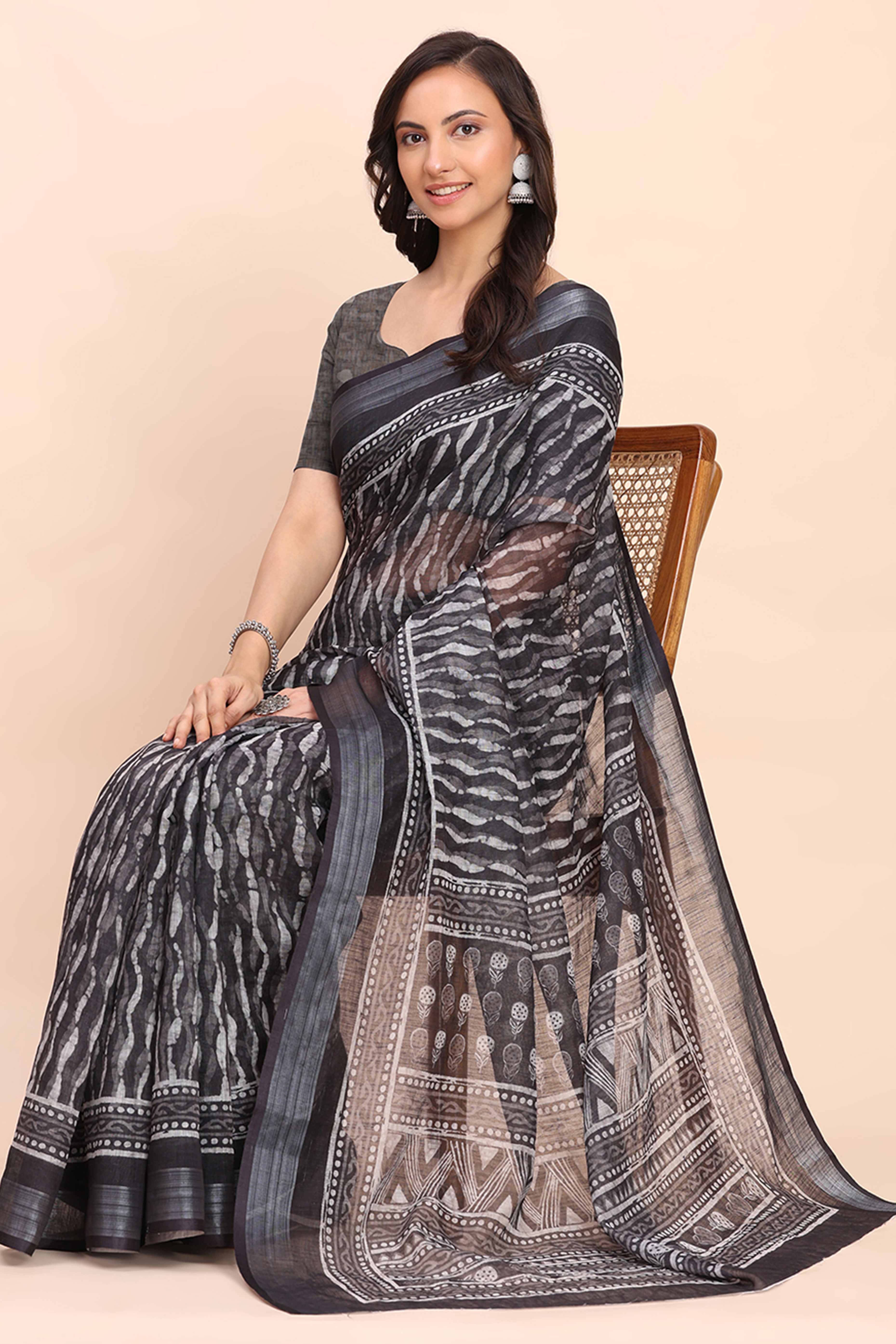 Black Linen Saree with Intricate Silver Weaving