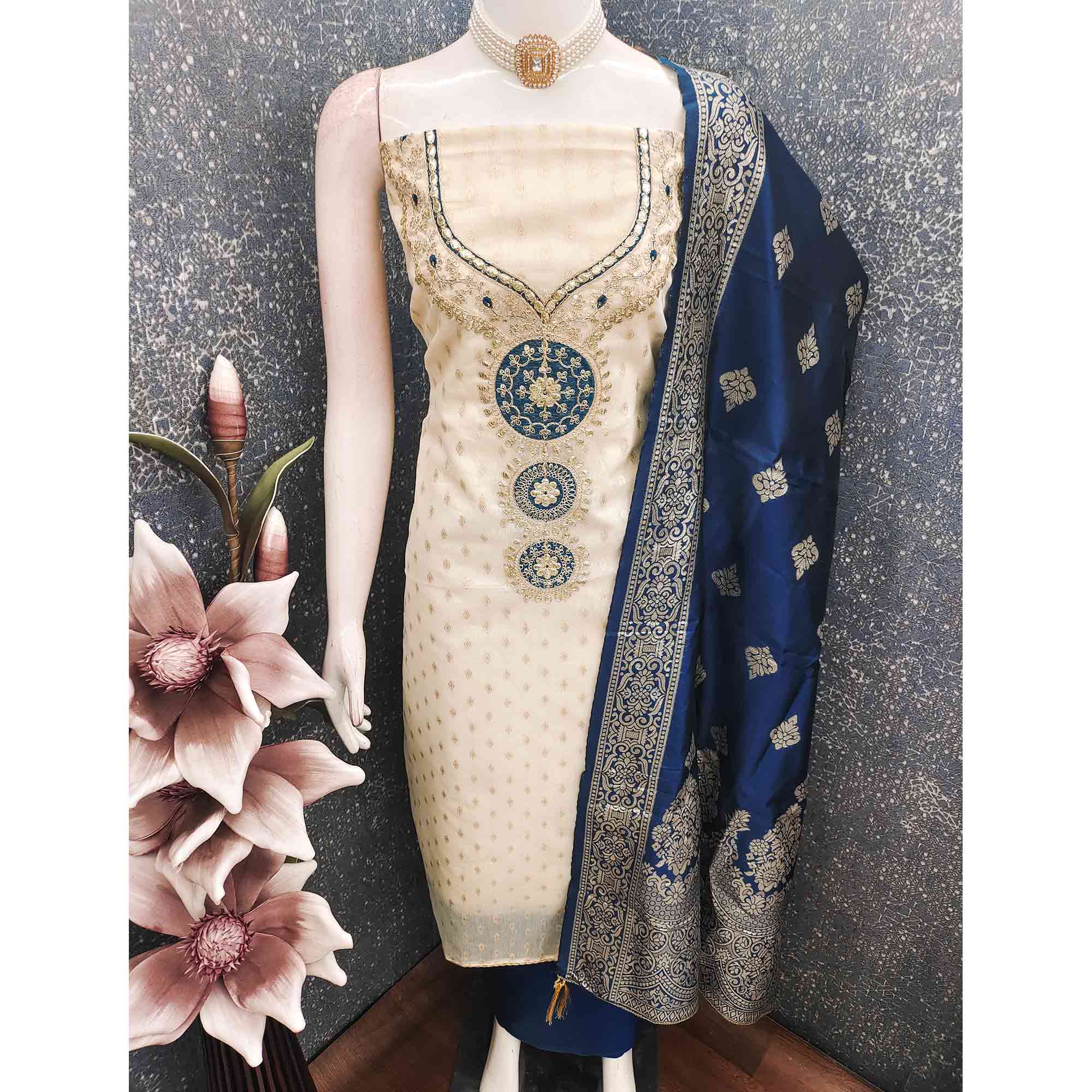 Cream & Blue Shimmer Dress Material Featuring Intricate Zari Weaving With Cording Embroidery