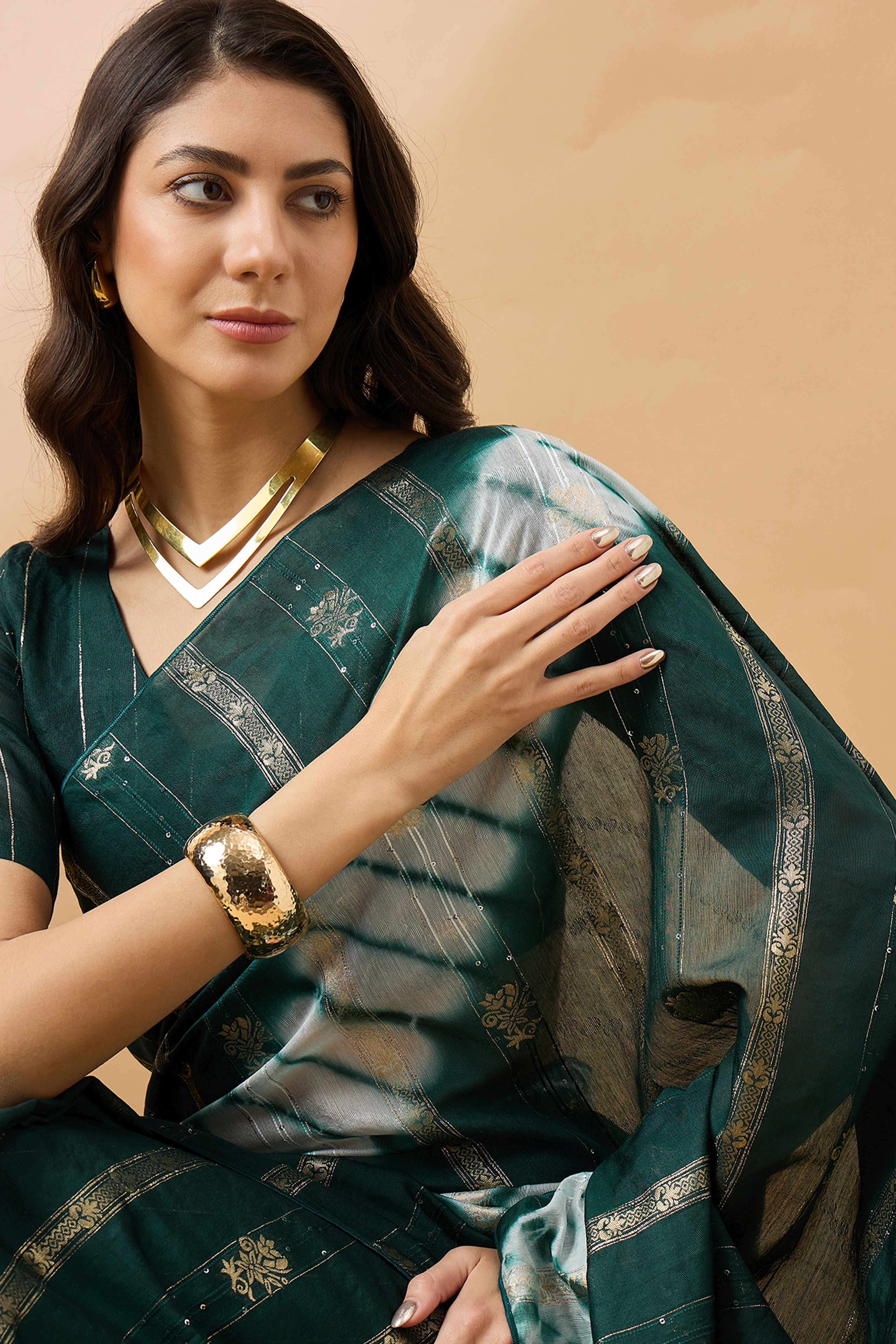 Green Floral Woven Staple Cotton Blend Saree Highlighted With Sequins Embroidery & Tasselled Pallu