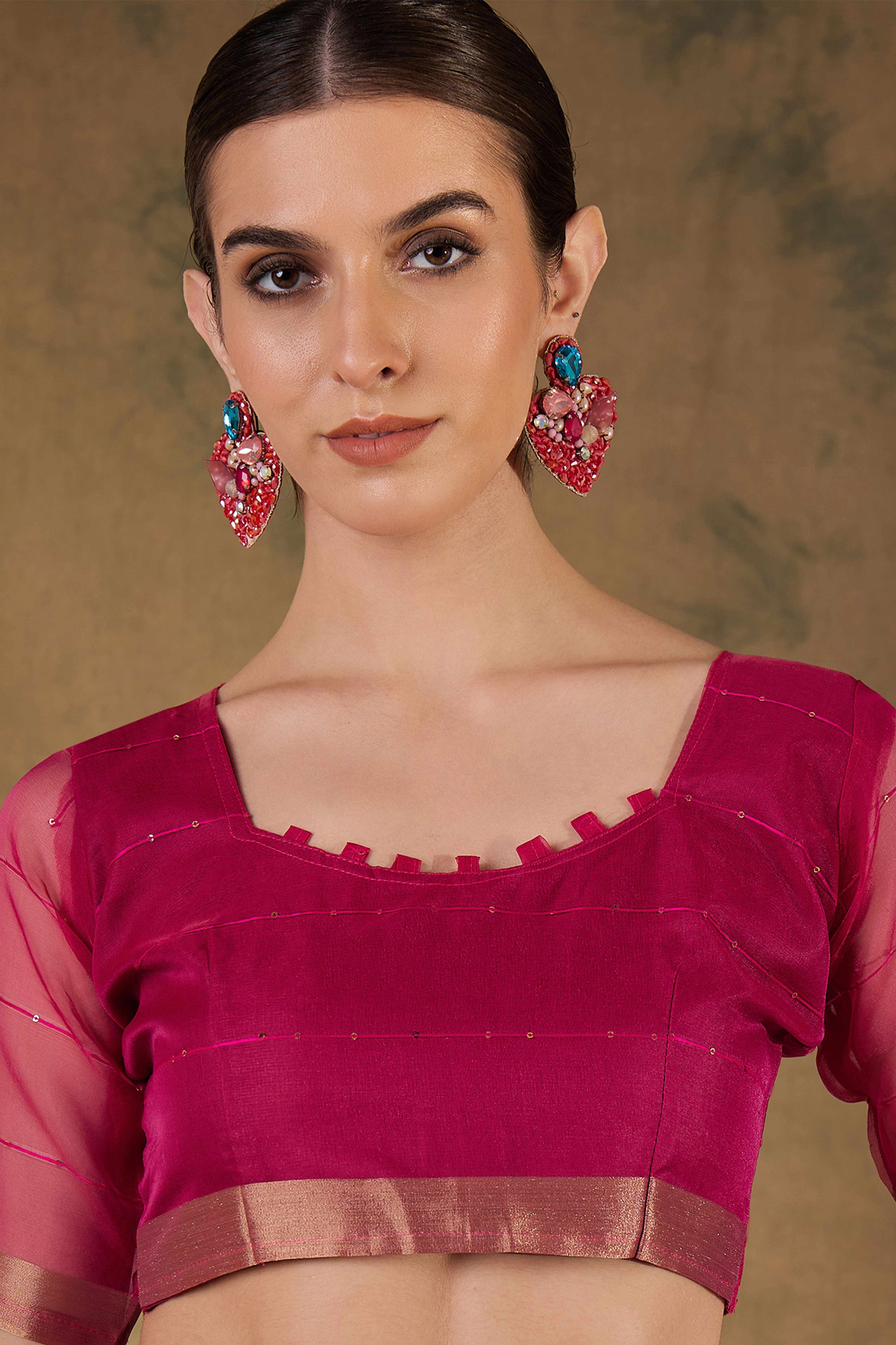 Pink Organza Silk Saree Featuring Shimmering Sequins Embroidery & Elegant Tasselled Pallu