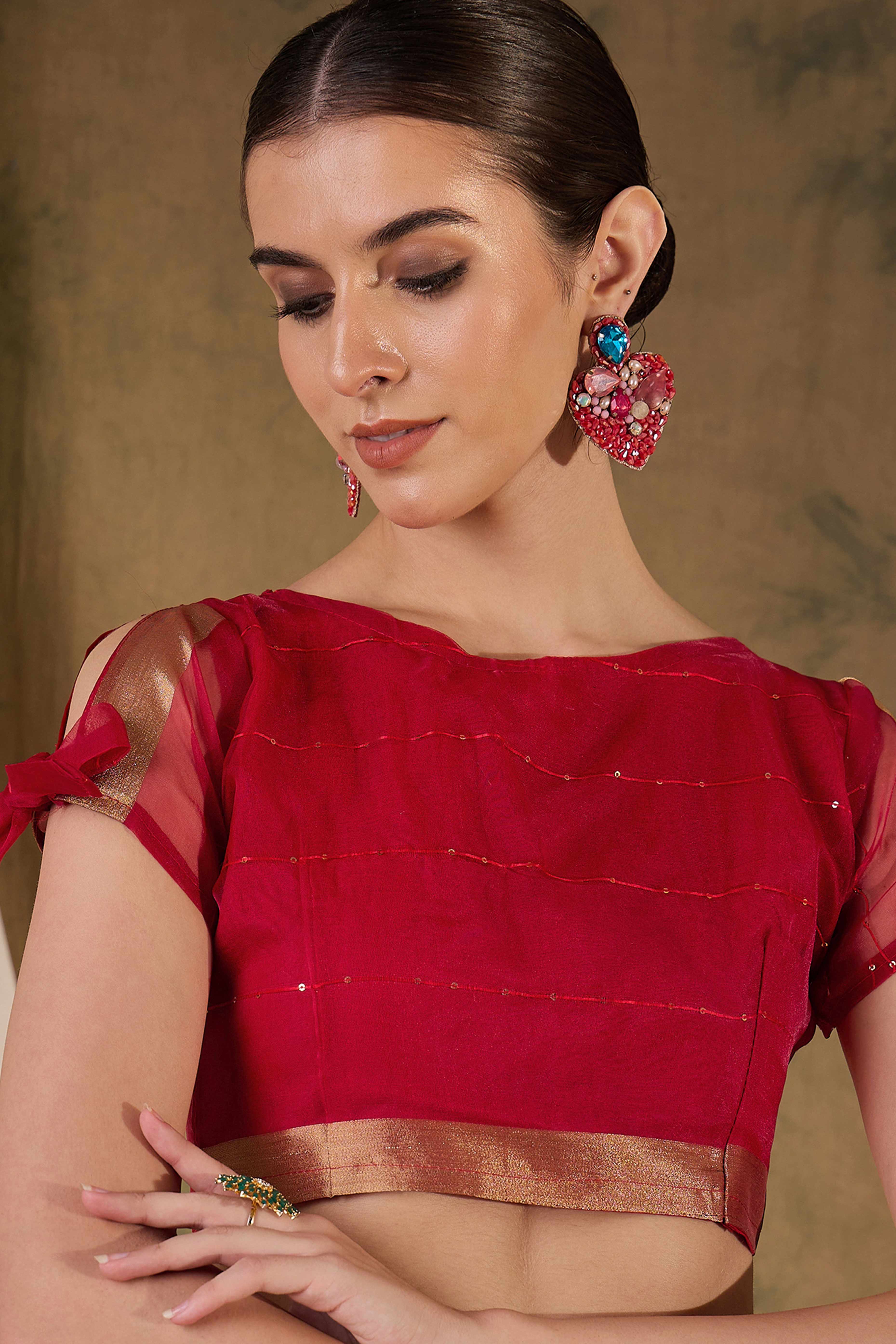 Red Organza Silk Saree Featuring Shimmering Sequins Embroidery & Elegant Tasselled Pallu