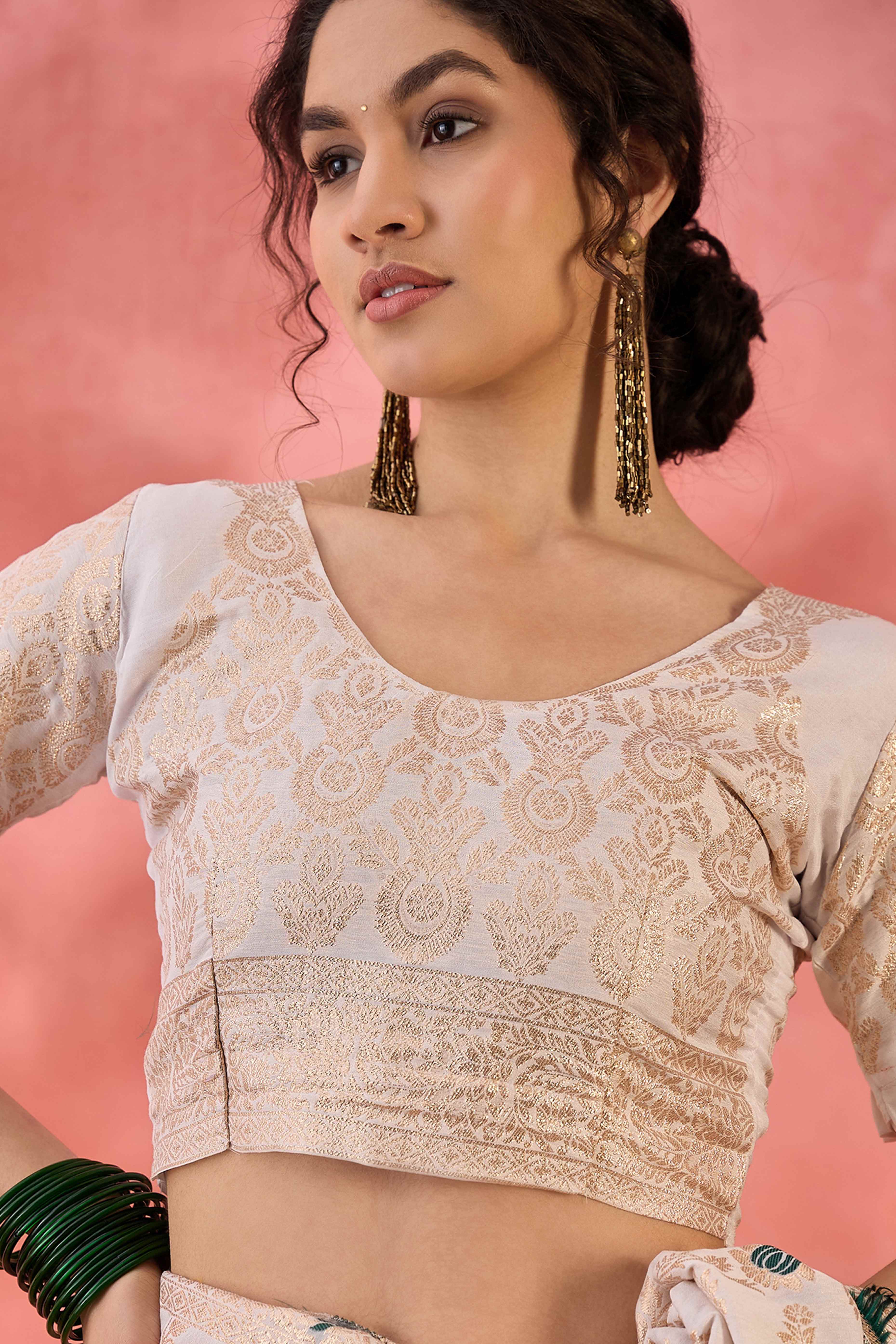 Offwhite Cotton Meena Jacquard Saree Featuring Intricate Floral Weaving & Tassels On The Pallu