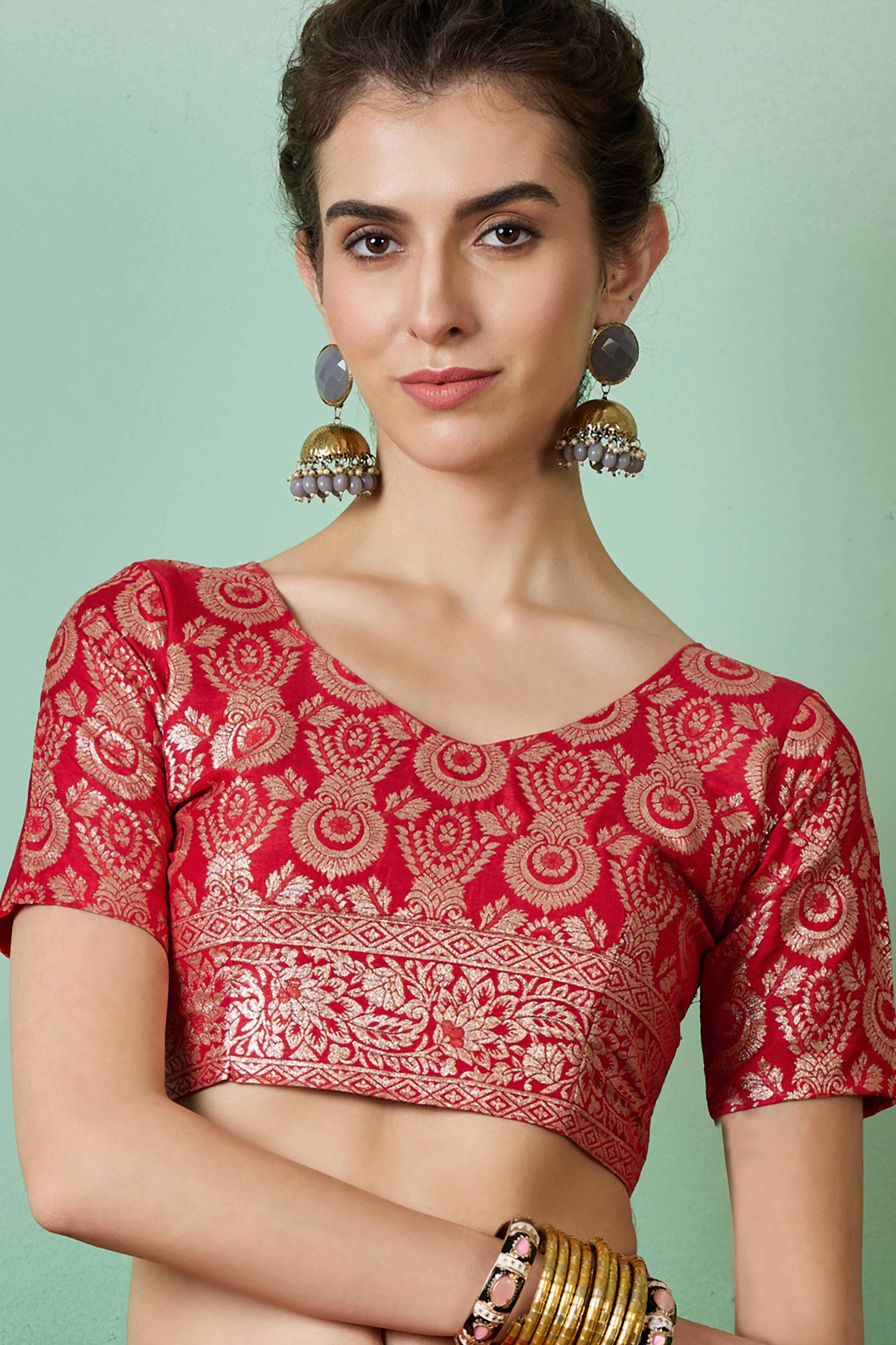 Red Cotton Meena jacquard Saree Featuring Intricate Floral Weaving & Playful Tassels On The Pallu