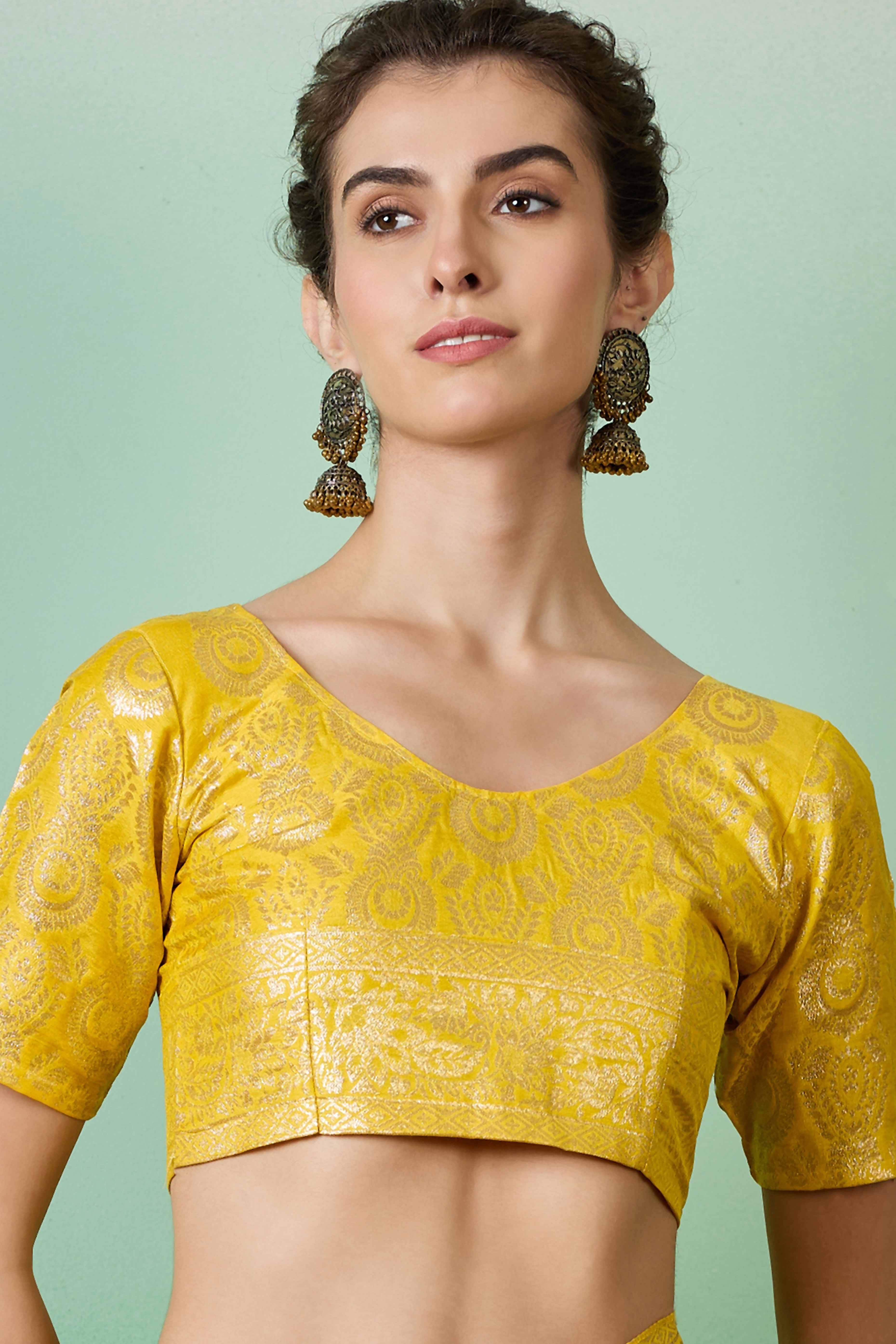 Yellow Cotton Meena jacquard Saree Featuring Intricate Floral Weaving & Tassels On The Pallu