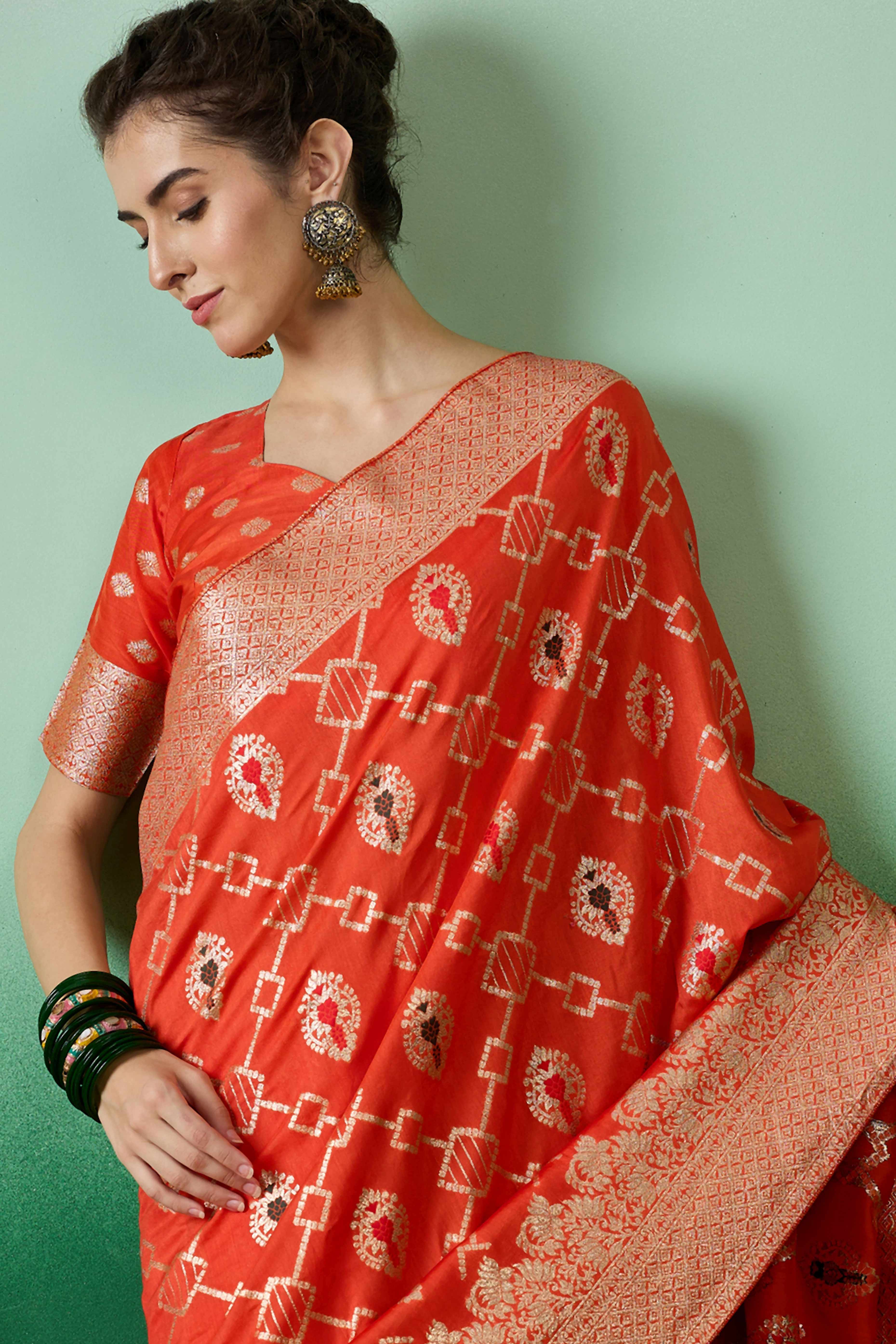 Orange Zari Woven Staple Cotton Blend Saree With Floral Motifs & Tassel Detailed Pallu