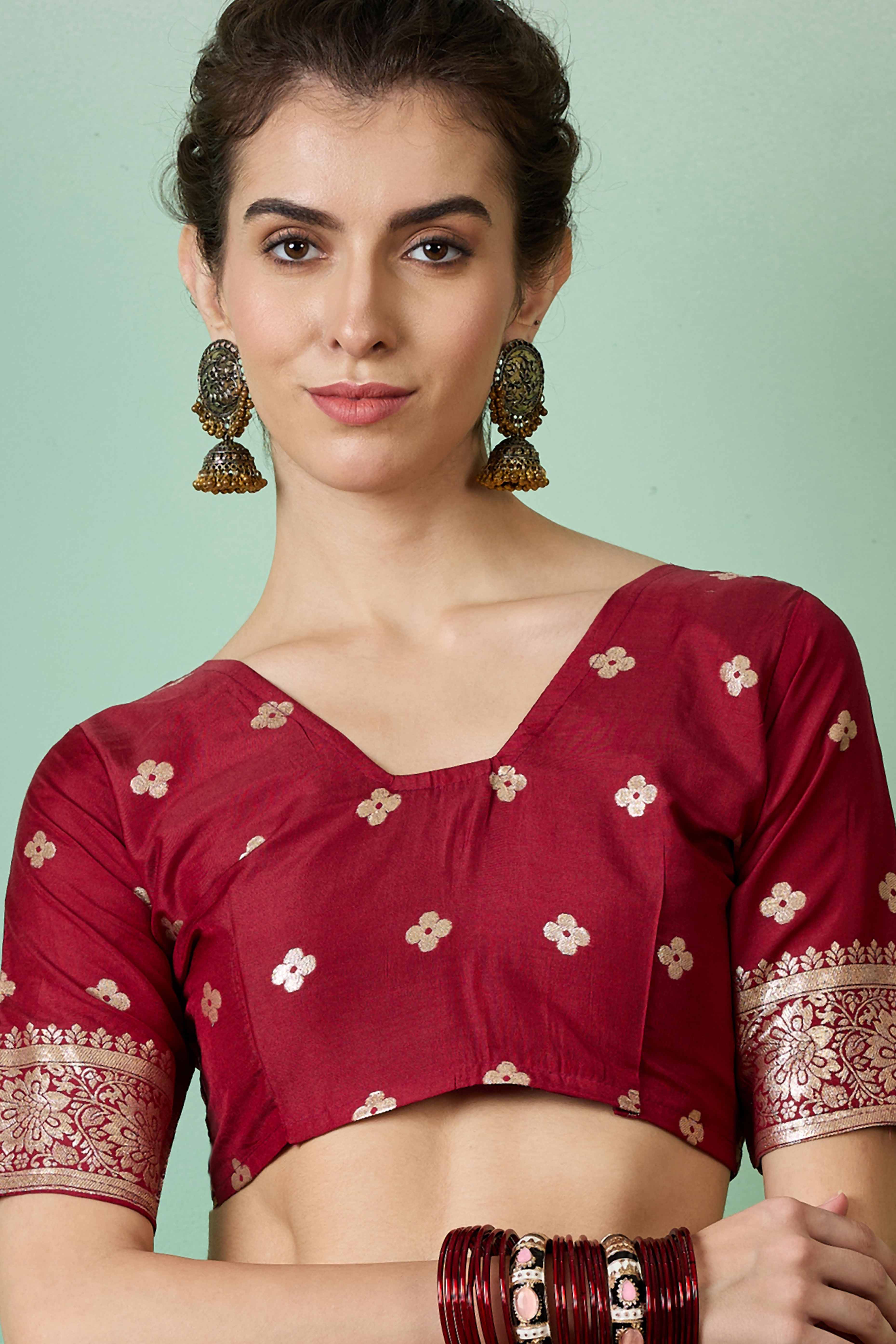 Maroon Cotton Blend Jacquard Saree Adorned With Floral Weaving & Graceful Tassel Pallu