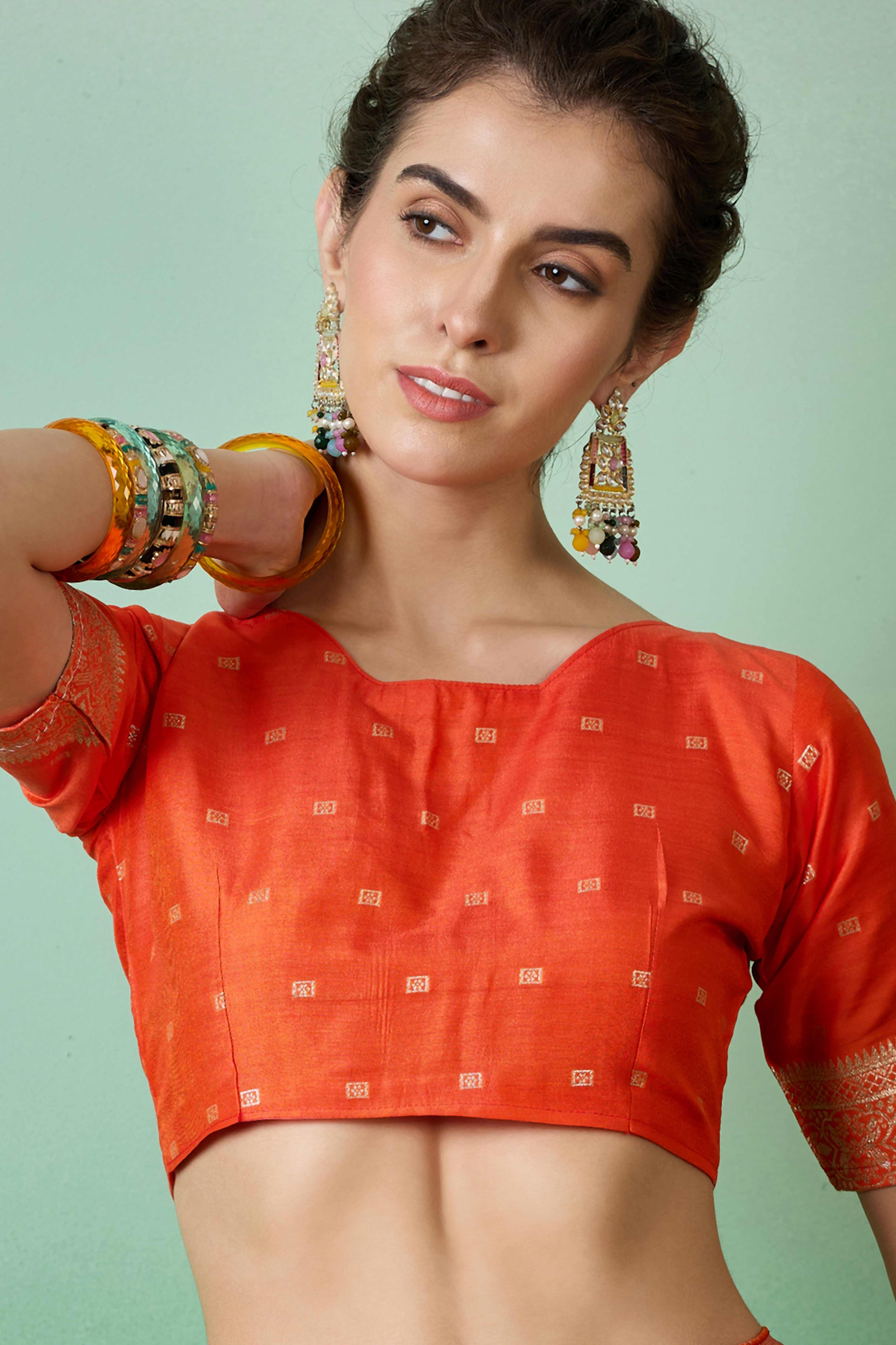 Orange Jacquard Saree In Cotton Blend Featuring Elegant Floral Weaving & A Tasselled Pallu