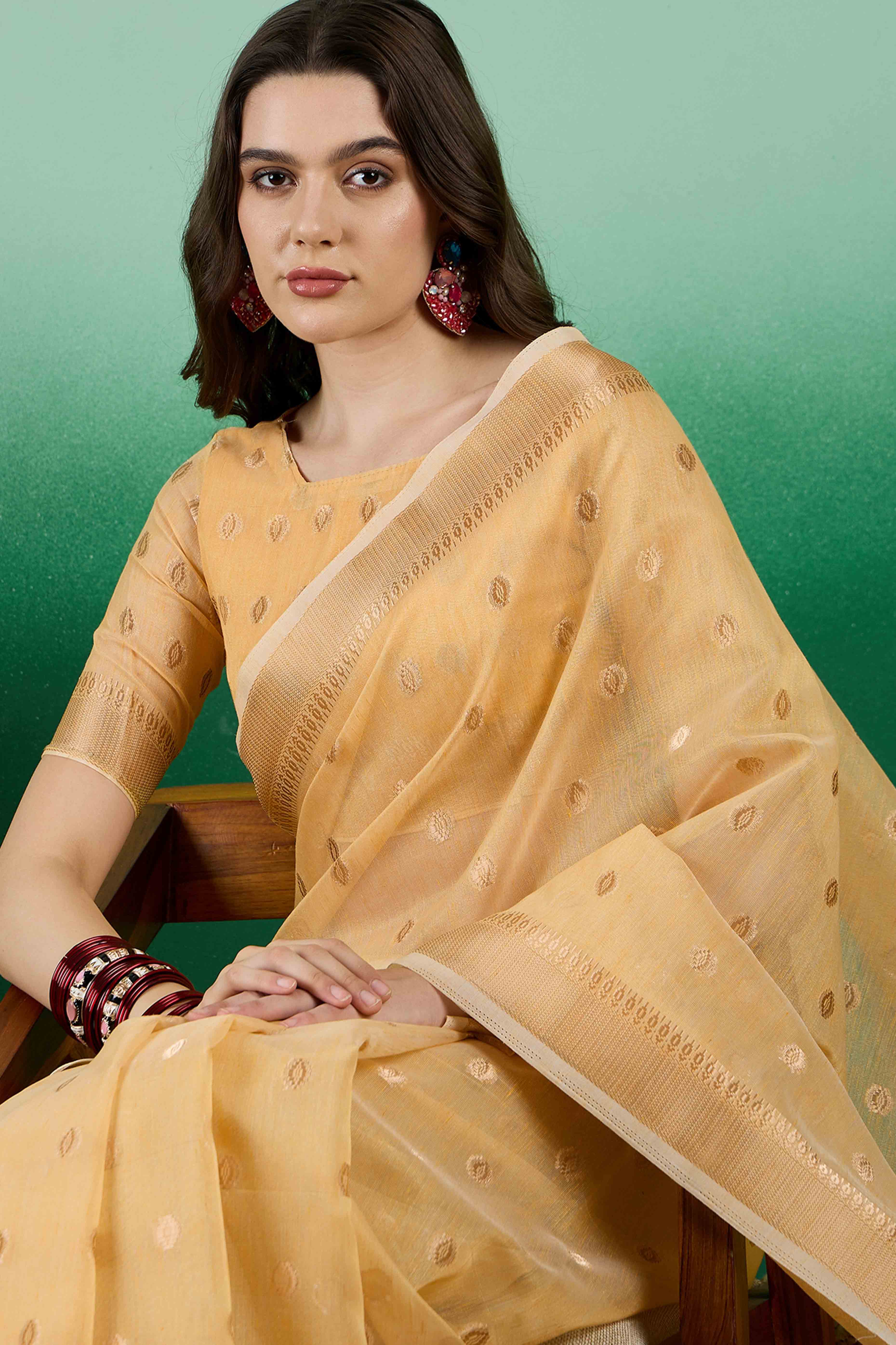 Yellow Khadi Organza Saree Embellished With Traditional Zari Work & Tassels