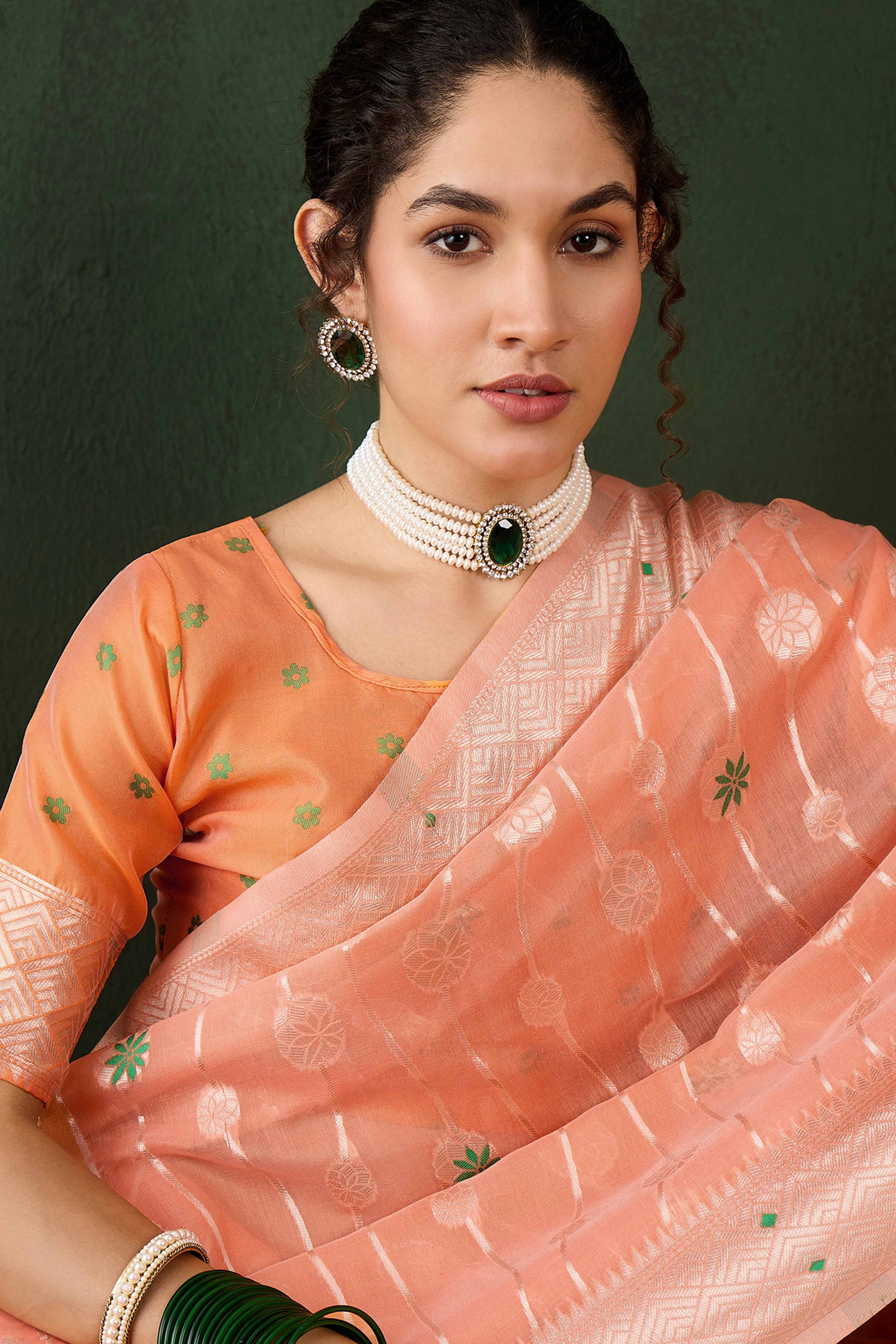 Orange Cotton Blend Saree Adorned With Intricate Floral Zari Weaving & A Stylish Tassel Pallu