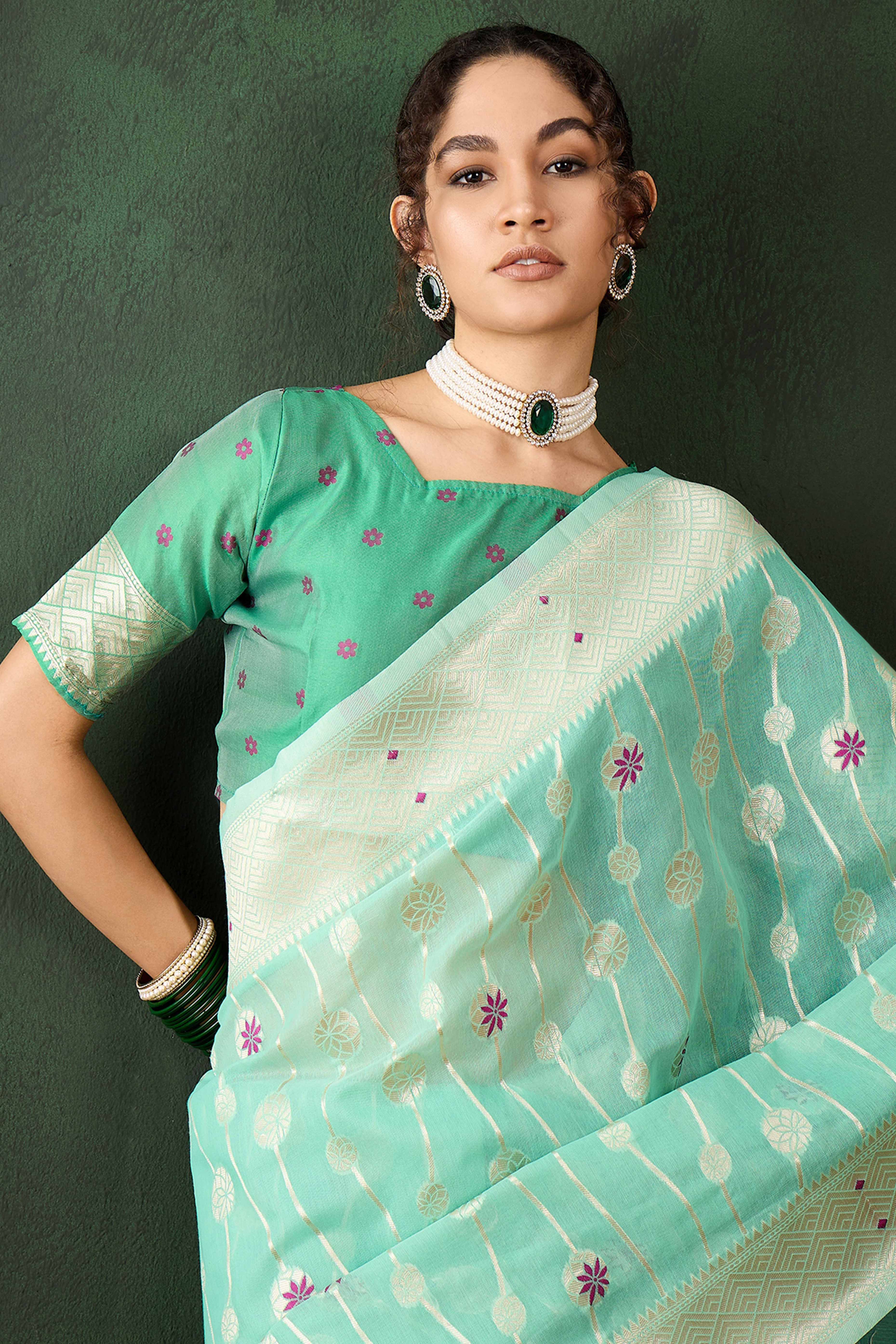 Sea Green Cotton Blend Saree Adorned With Intricate Floral Zari Weaving & A Stylish Tassel Pallu