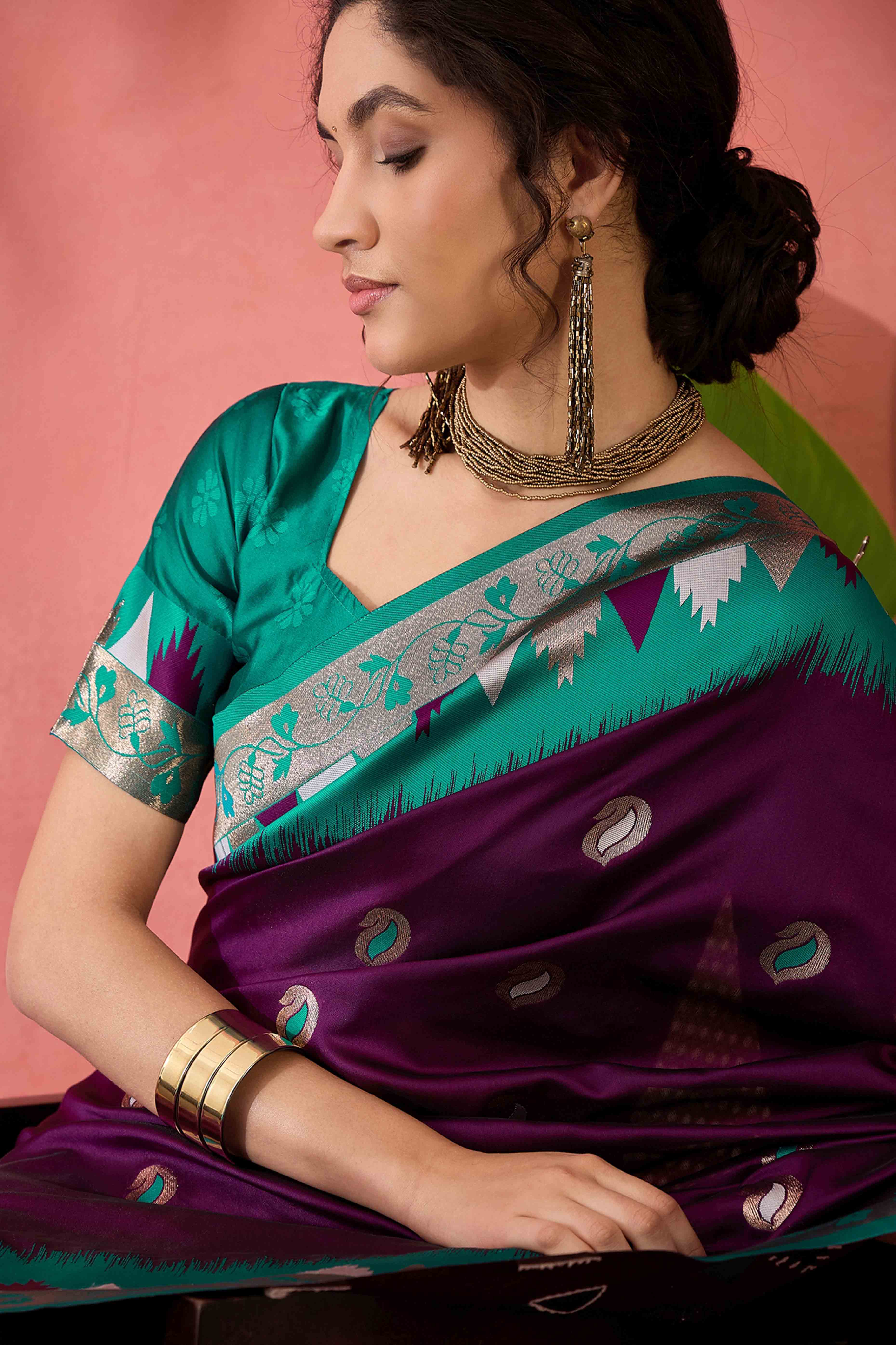 Wine Zari Woven Poly Silk Saree Enhanced With Graceful Tassel Detailing
