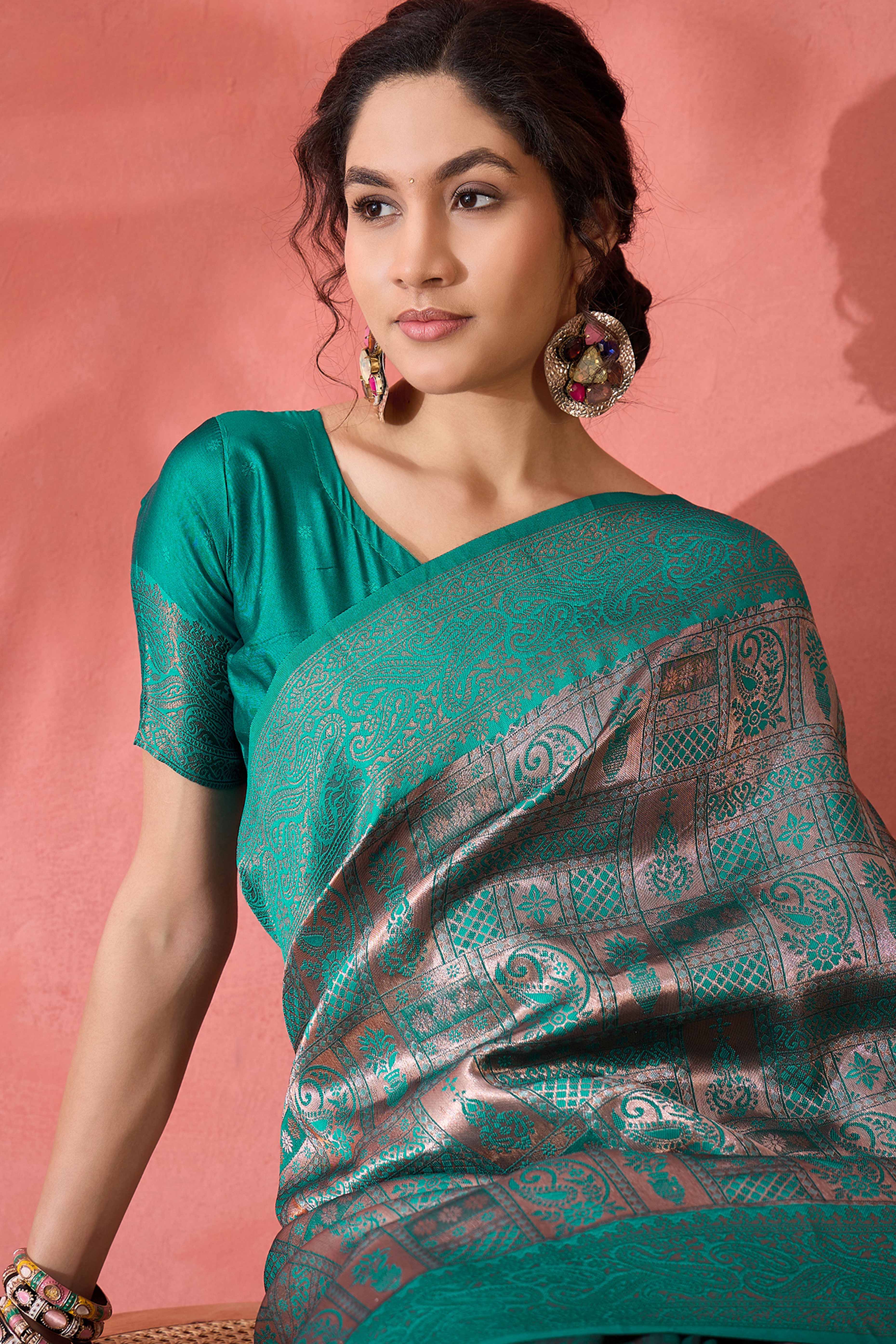 Rama Green Woven Poly Silk Blend Saree Featuring Floral & Paisley Motifs With Tassel Accents