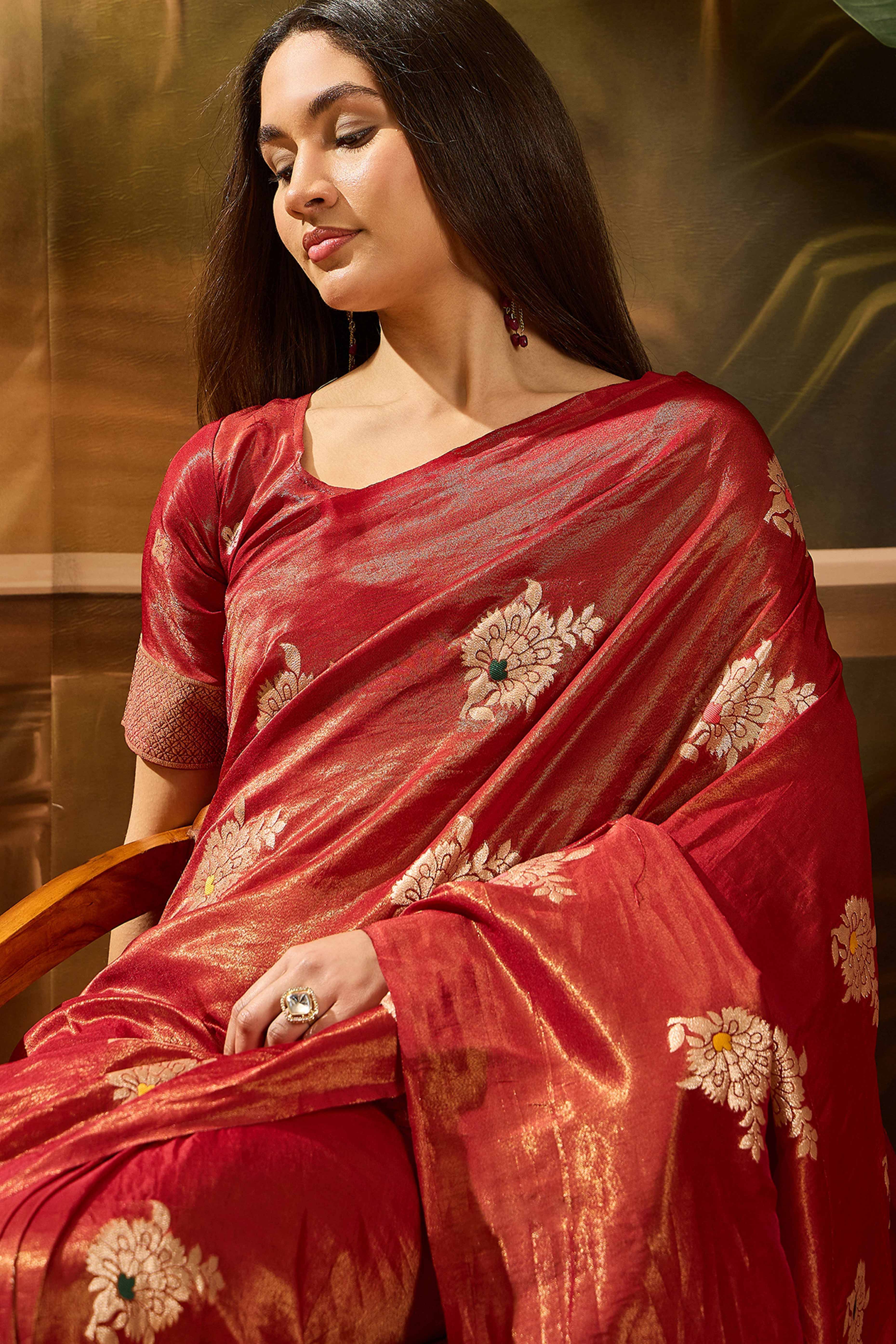 Maroon Shimmer Saree Featuring Intricate Floral Zari Weaving & Tassel Finish