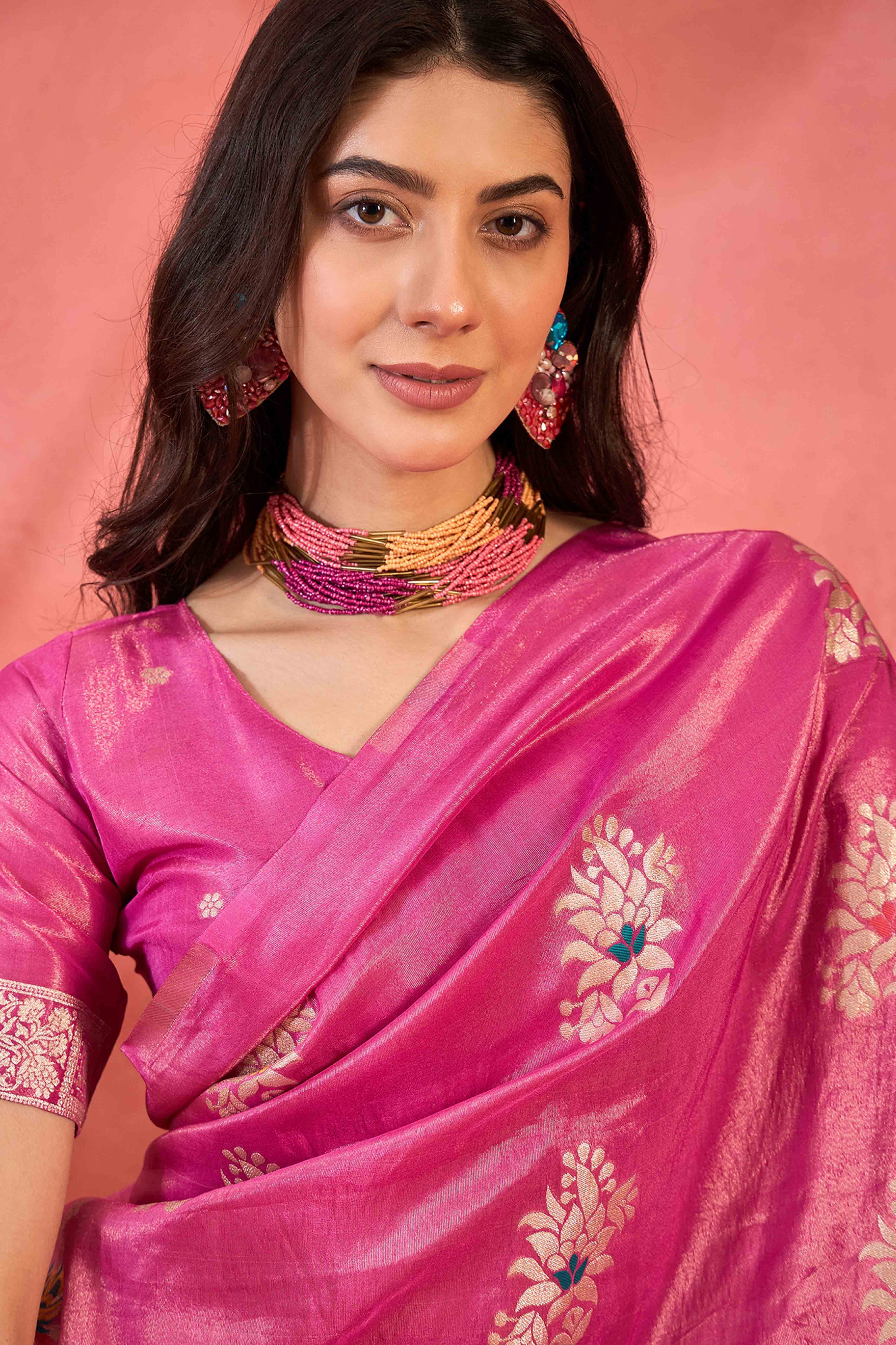 Pink Shimmer Saree Showcasing Floral Zari Weaving & A Tasselled Pallu