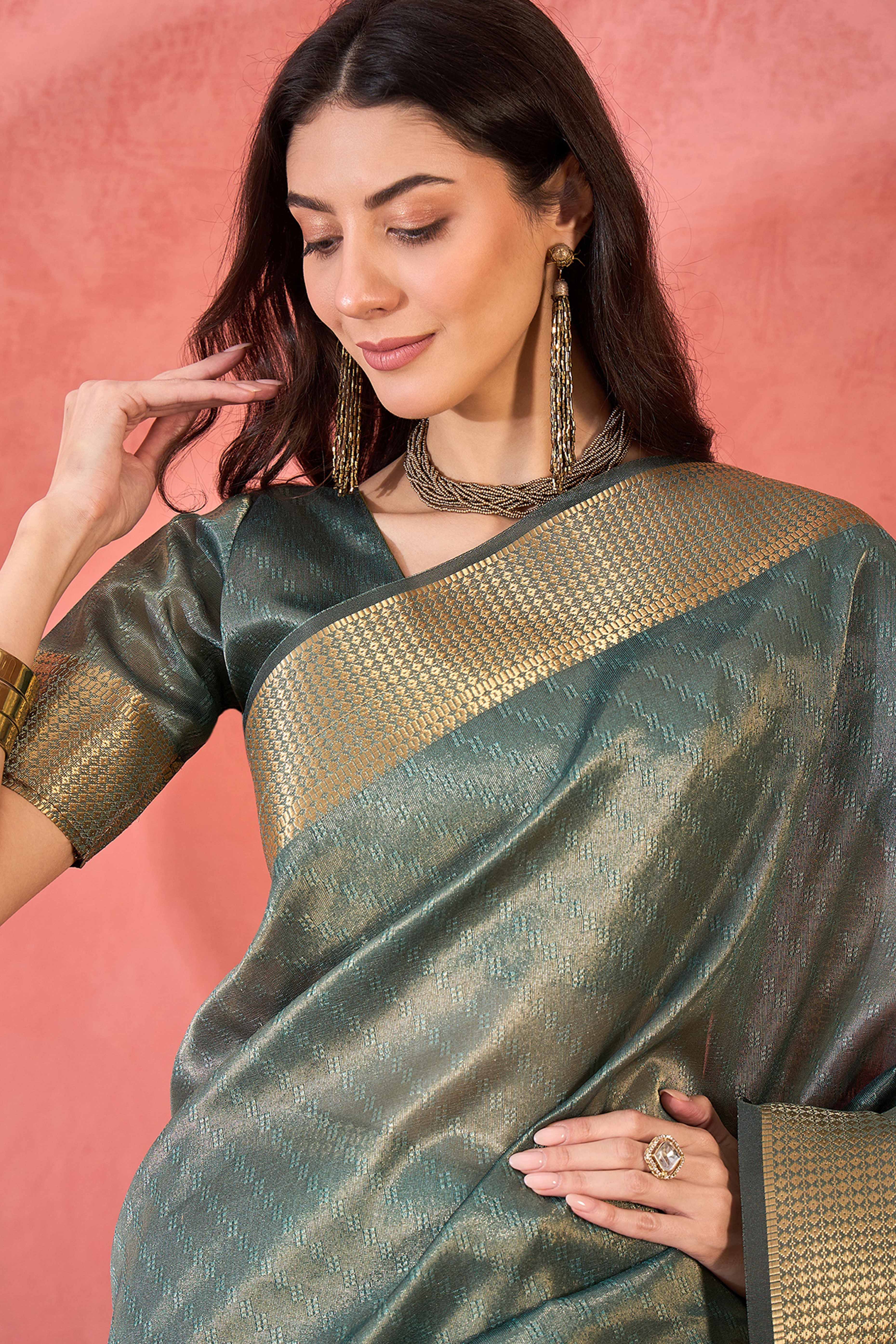 Teal Green Khadi Organza Saree Intricate Weaving & Sparkling Stonework With Tassel Pallu