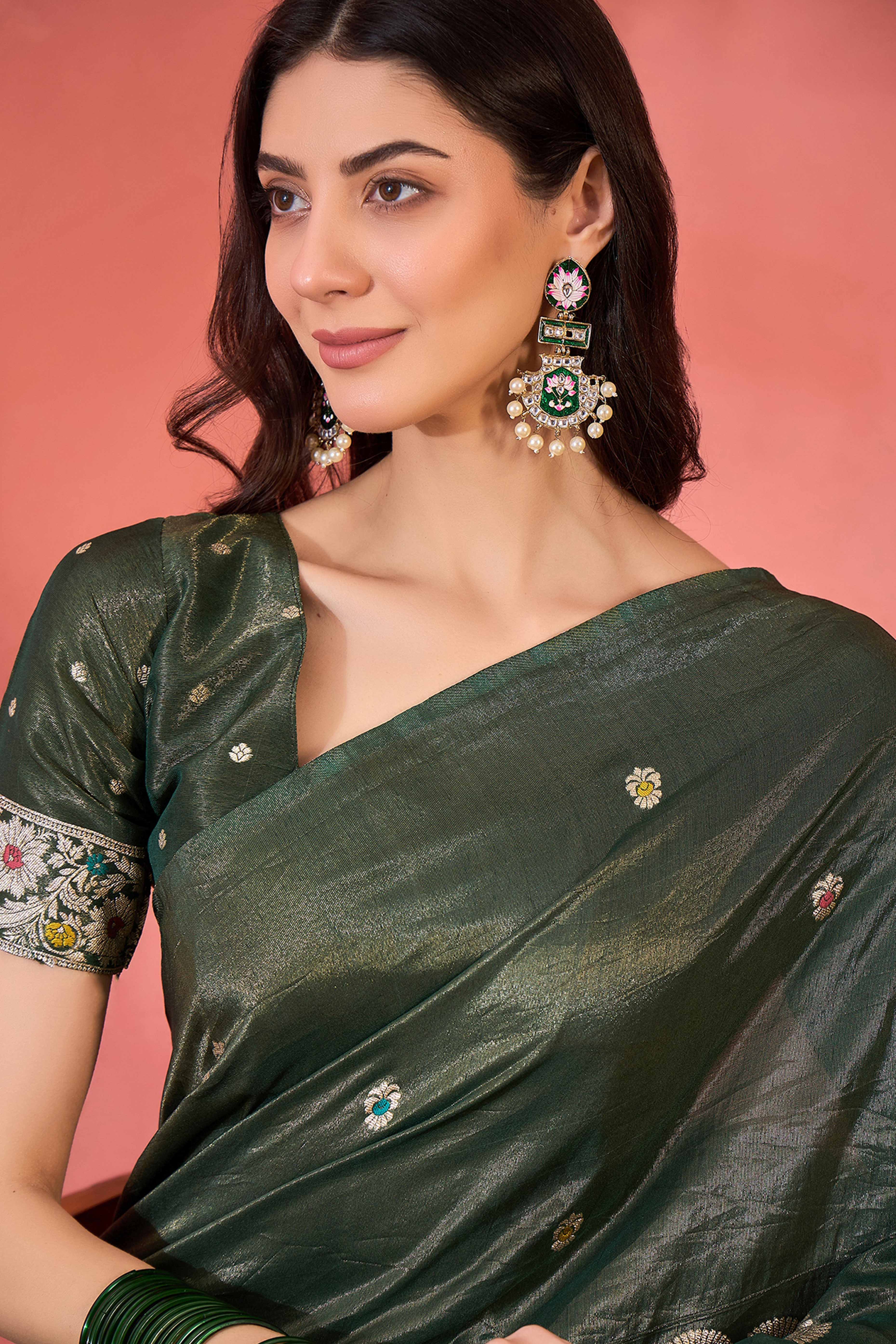 Green Zari Woven Shimmer Saree With Floral Motifs & Flowing Tassel Pallu