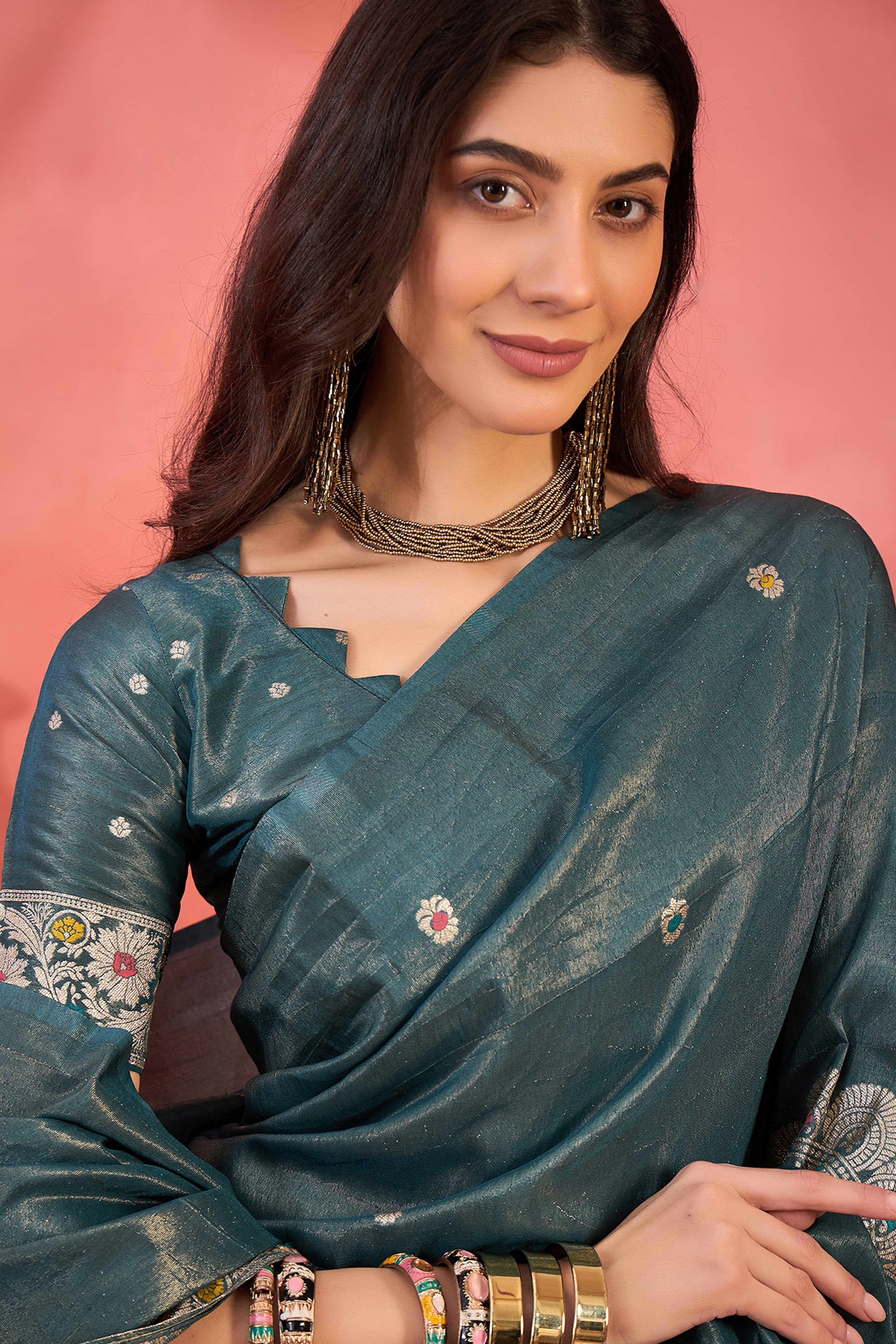 Teal Blue Zari Woven Shimmer Saree With Floral Motifs & Flowing Tassel Pallu