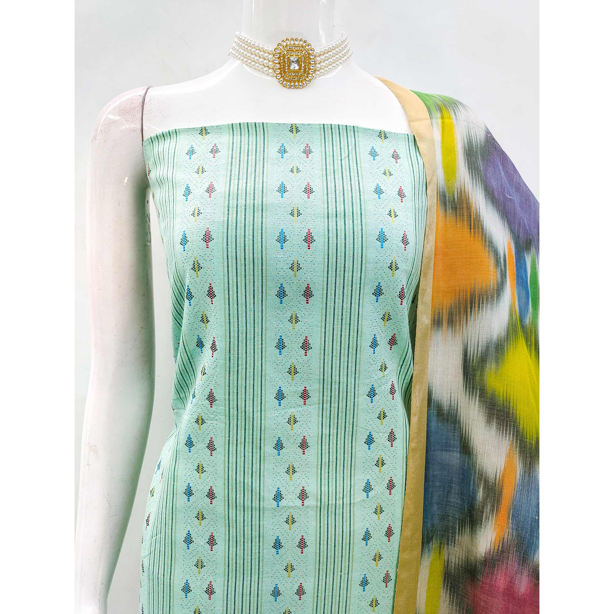 Make a Statement With Turquoise Woven Cotton Blend Dress Material