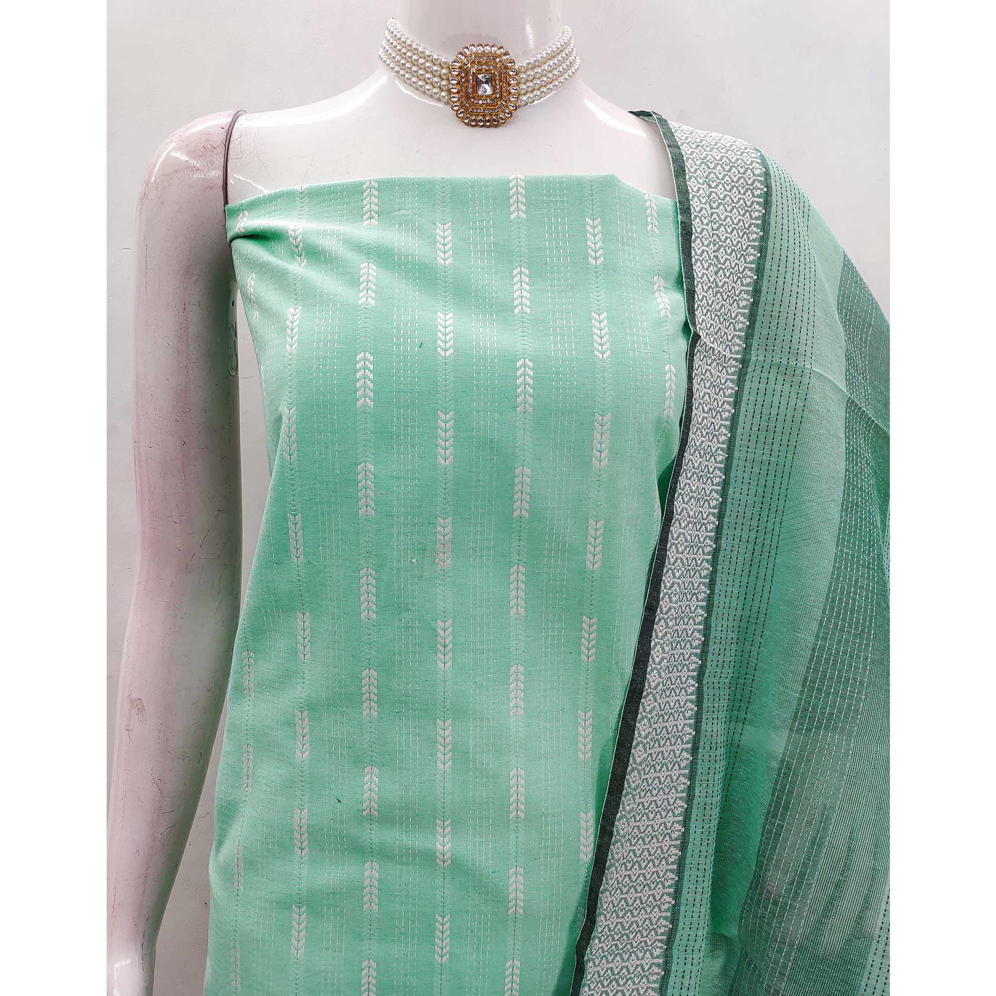 Refreshing Turquoise Woven Texture Dress Material In Poly Cotton Blend