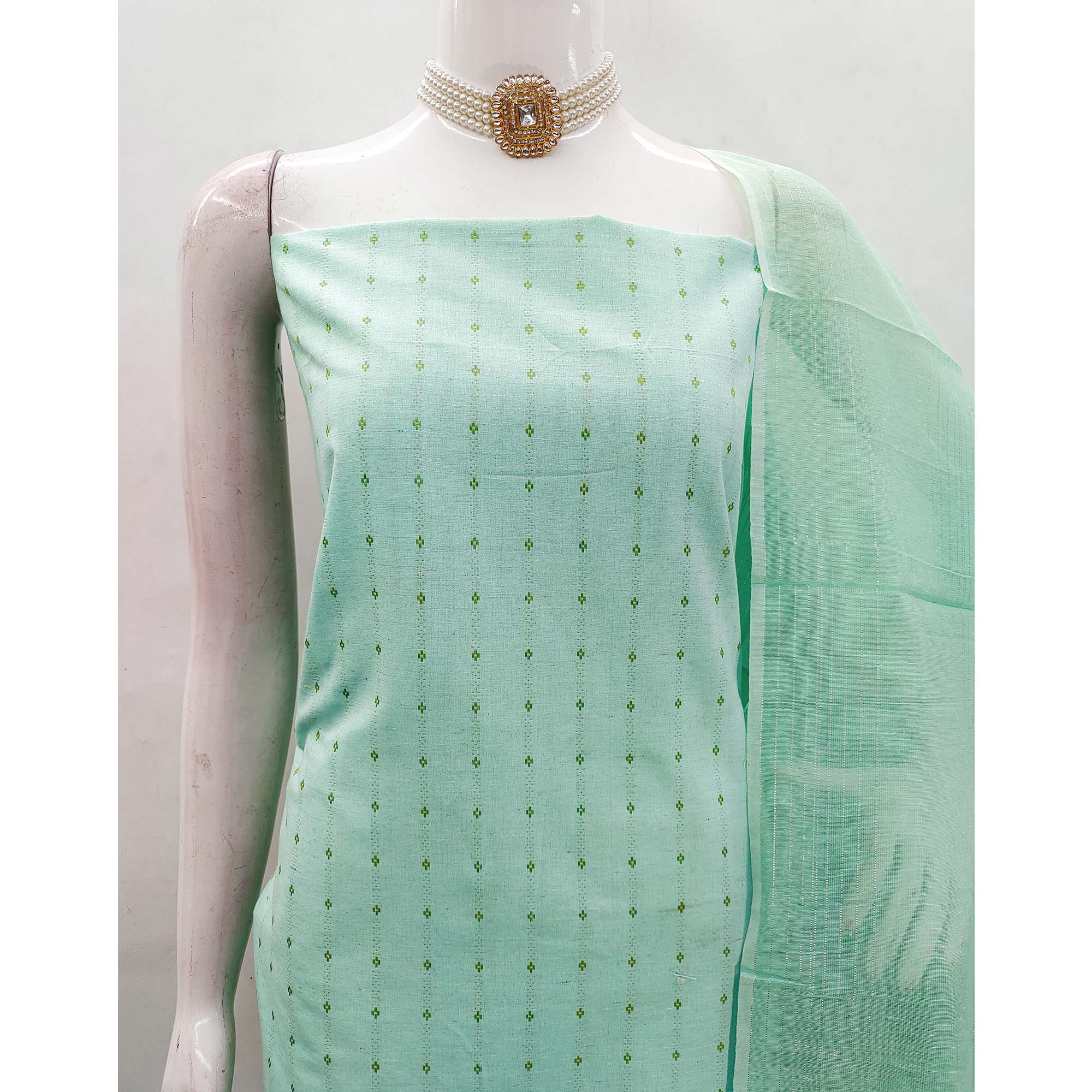 Graceful Turquoise Woven Poly Cotton Blend Dress Material