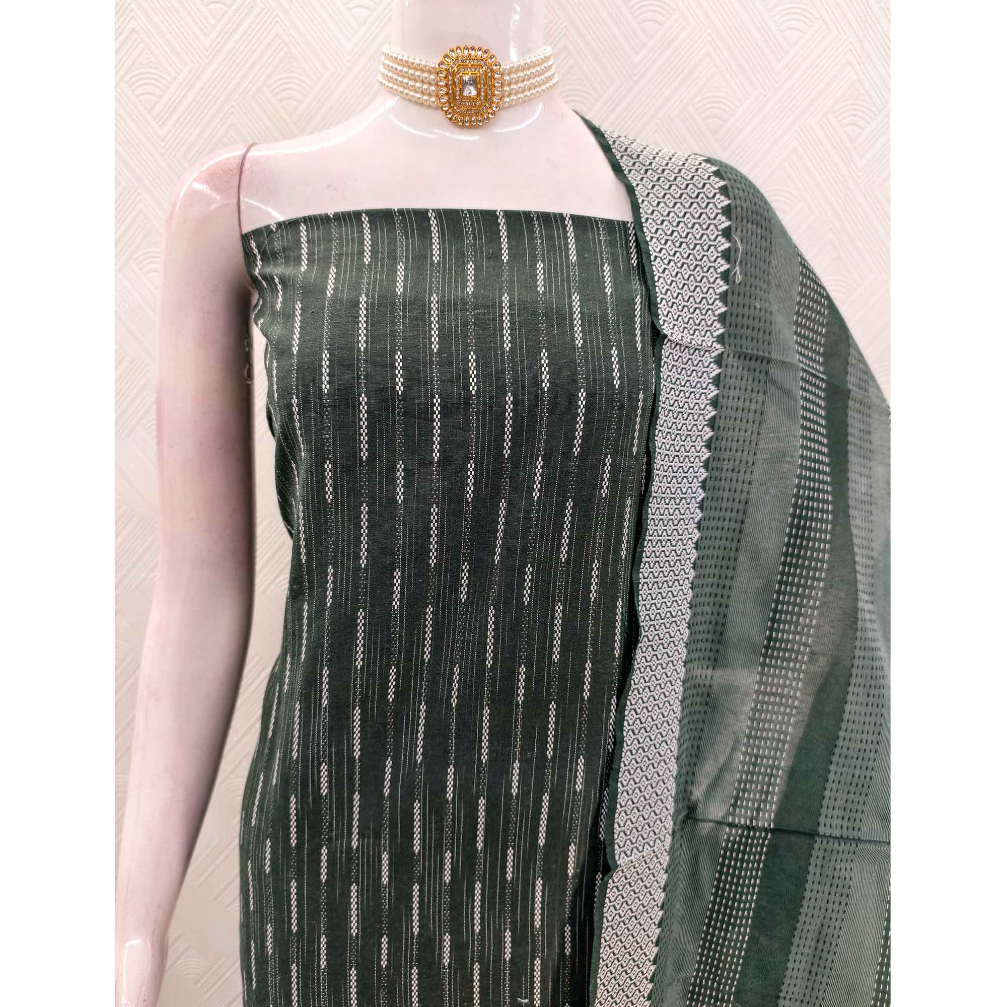 Green Poly Cotton Blend Dress Material Adorned With Striped Weaving Work