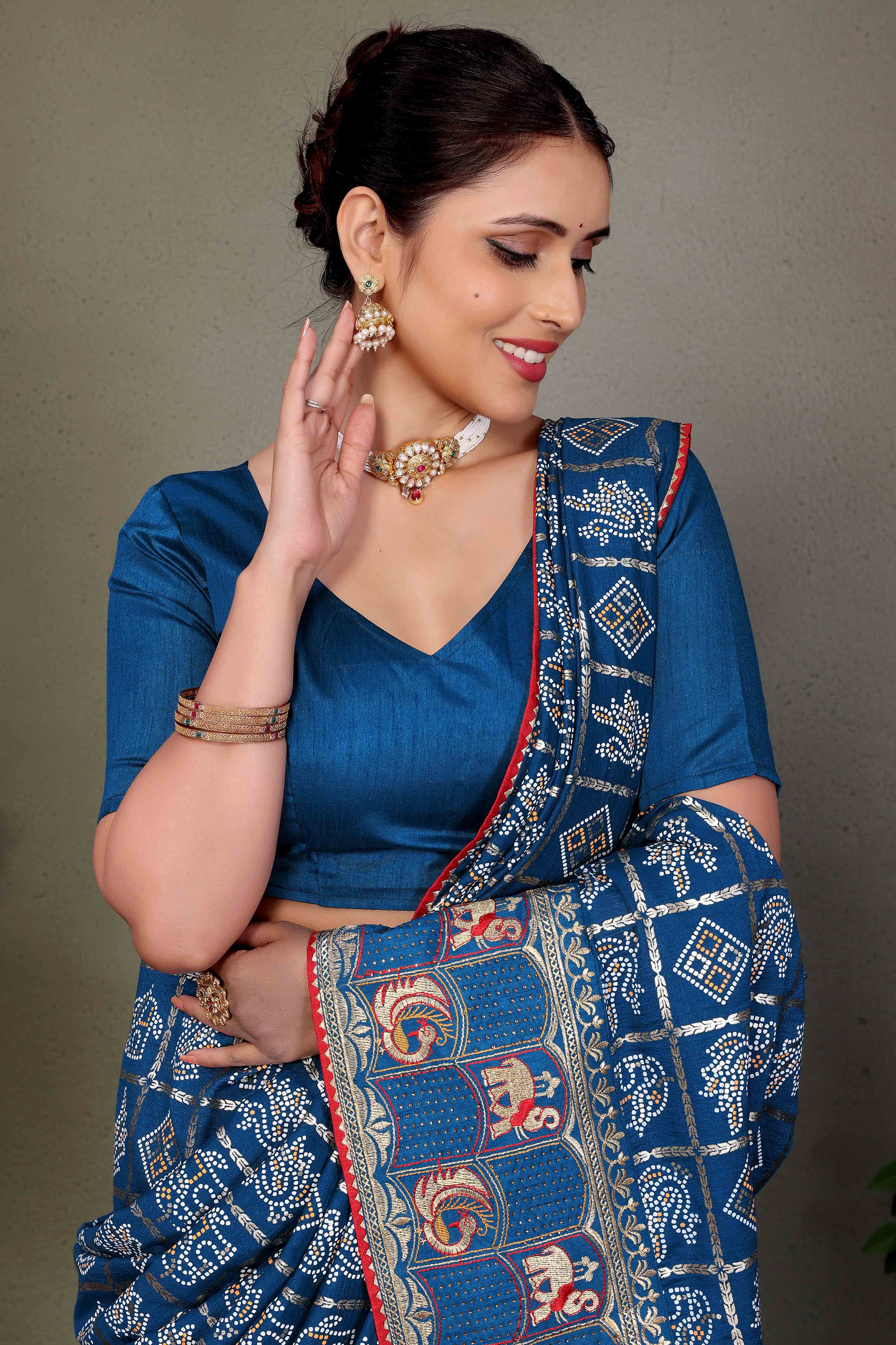 Blue Vichitra Silk Saree Featuring Bandhani Patterns and Graceful Embroidered Borders