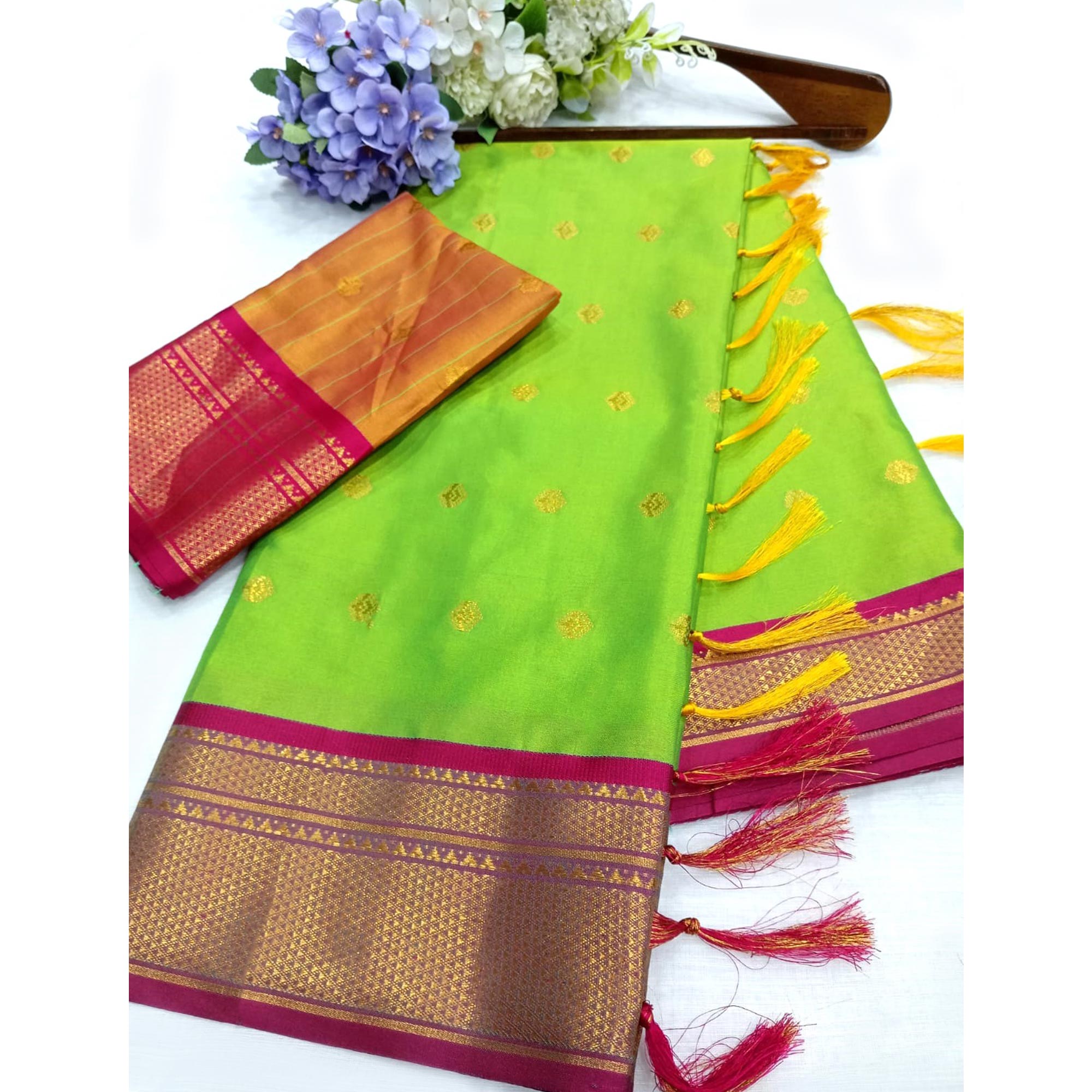 Green Zari Woven Lichi Art Silk Saree With Tassels