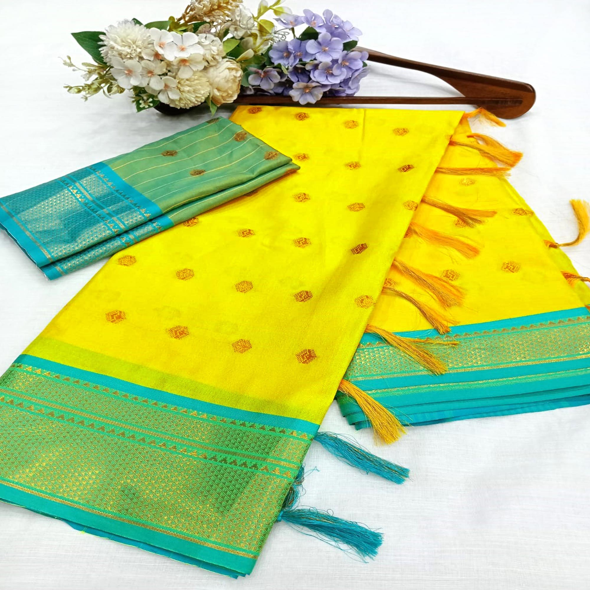 Lemon Yellow Zari Woven Lichi Art Silk Saree With Tassels