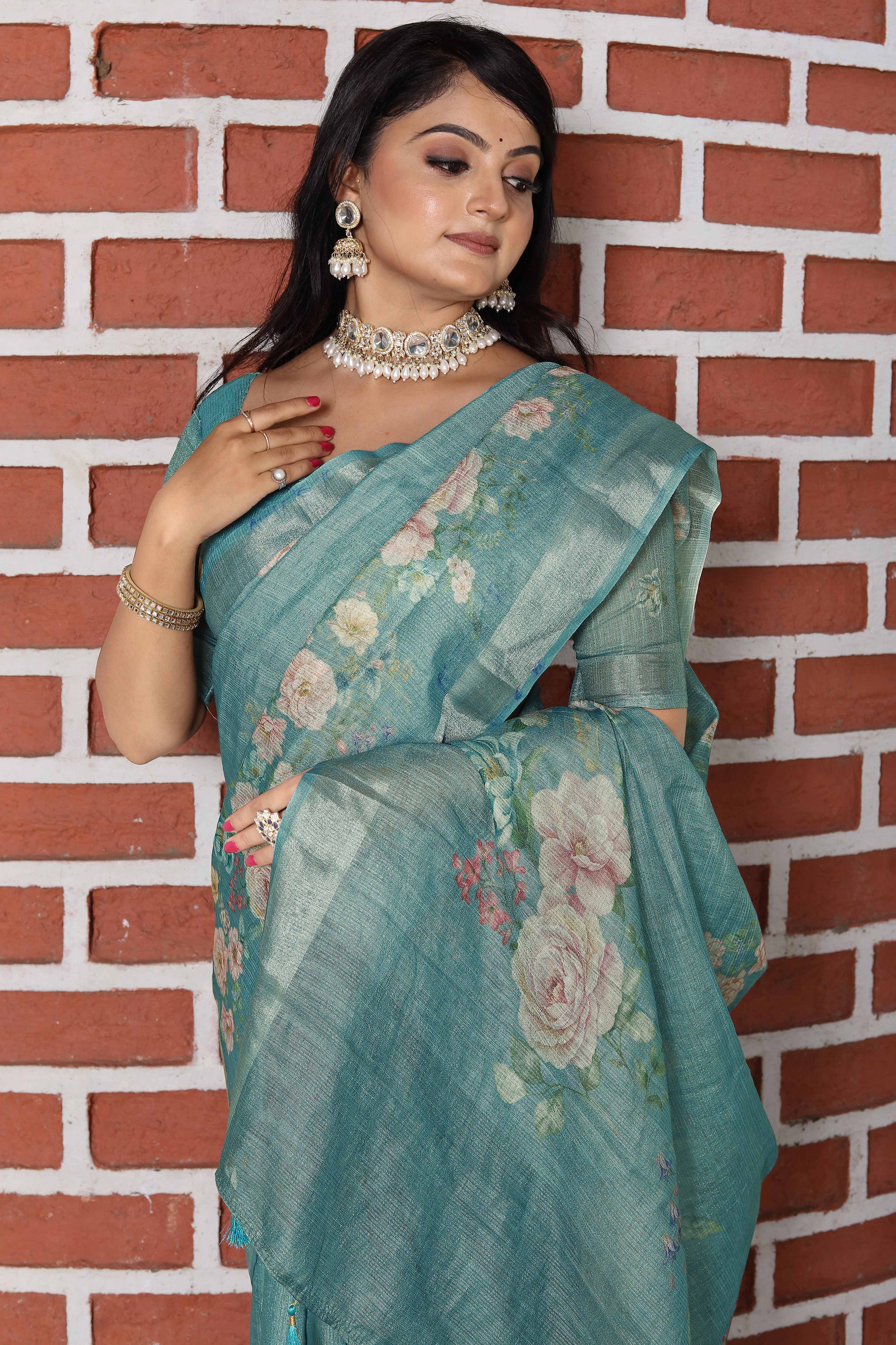 Beautiful Rama Green Tissue Handloom Saree with Detailed Digital Floral Embellishments