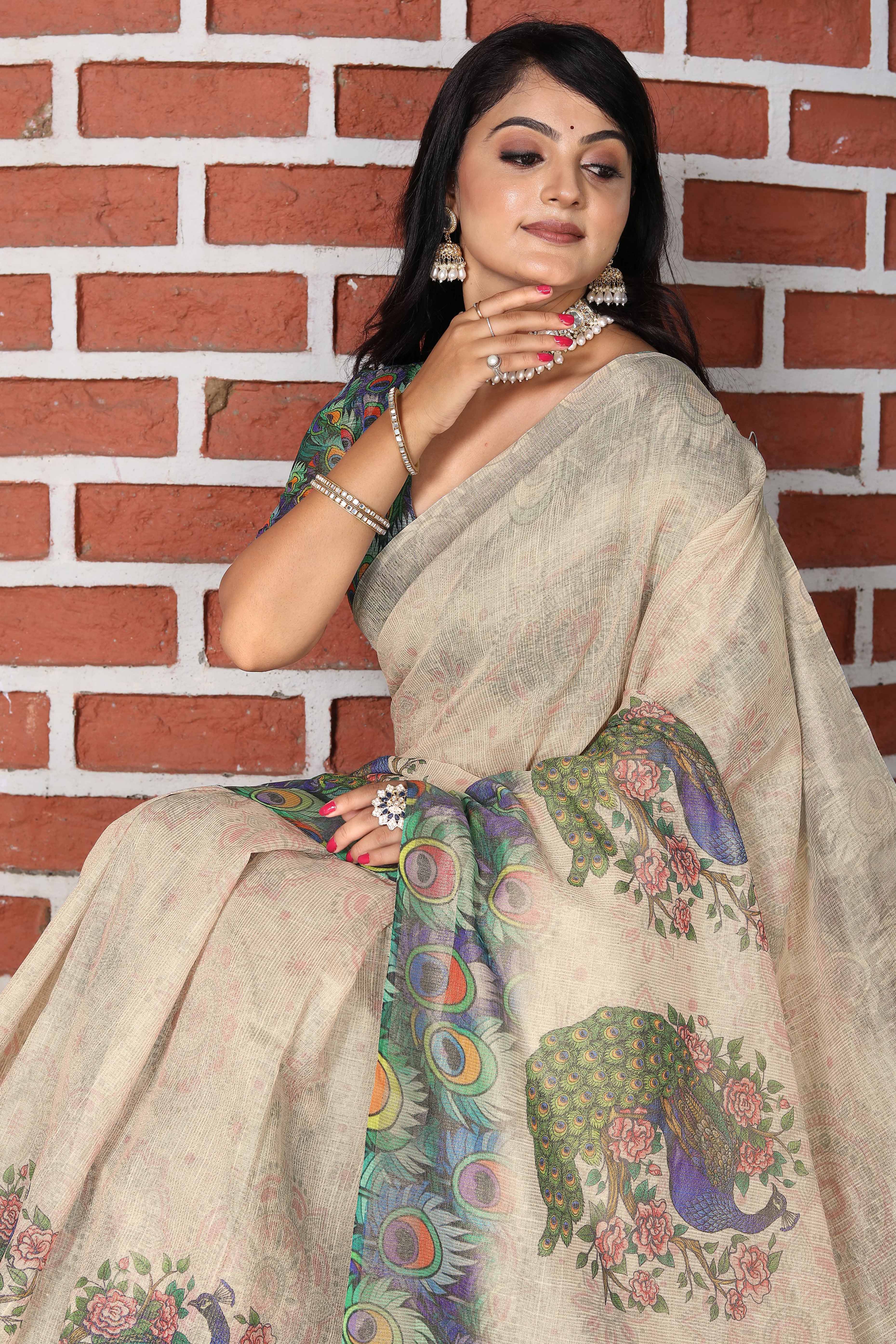 Beautiful Beige Tissue Handloom Saree with Detailed Floral Embellishments