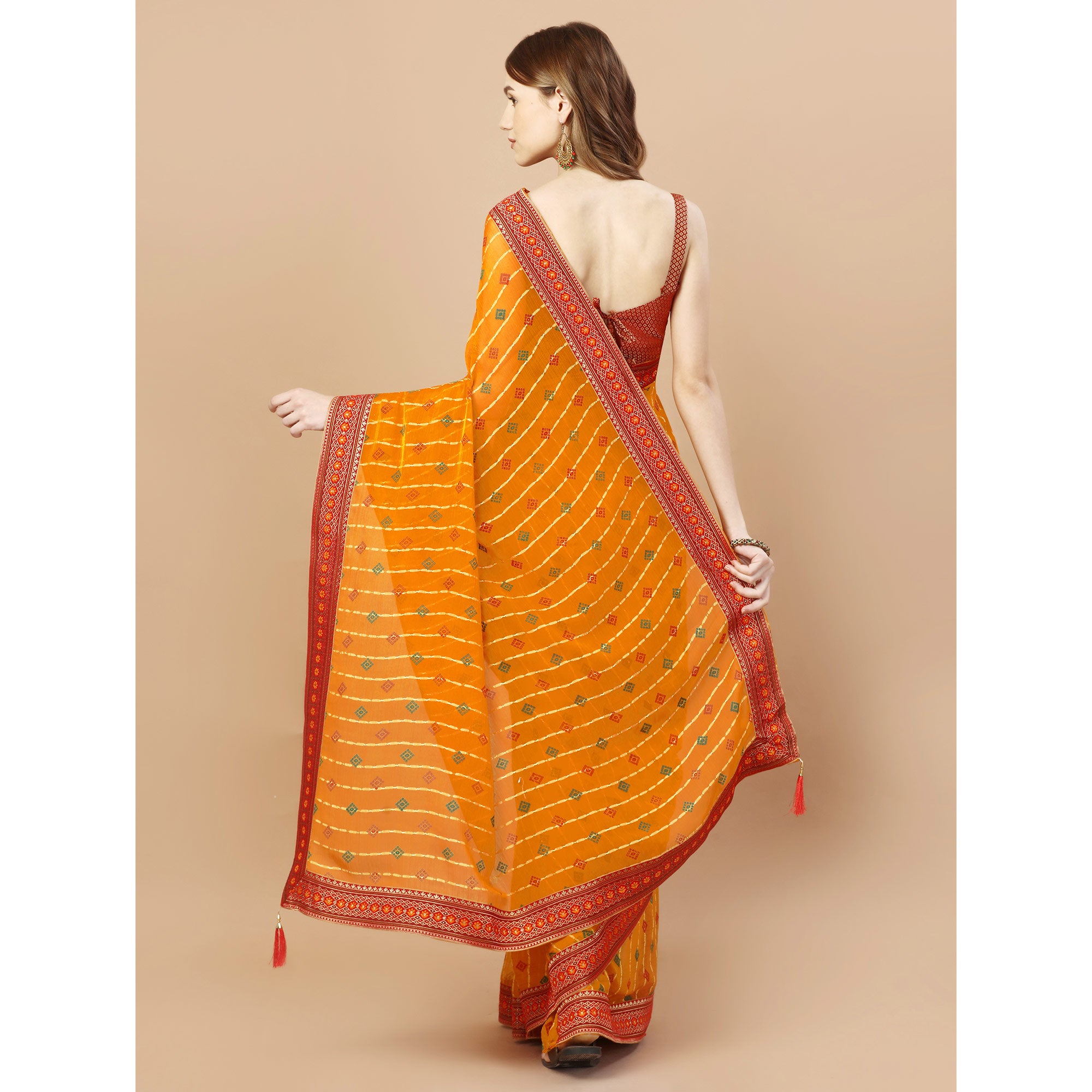 Orange Foil Printed Chiffon Saree With Lace Border