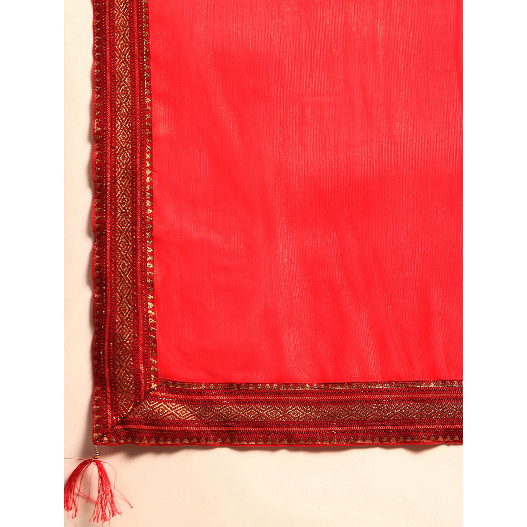 Pink Solid With Woven Border Chiffon Saree With Tassels