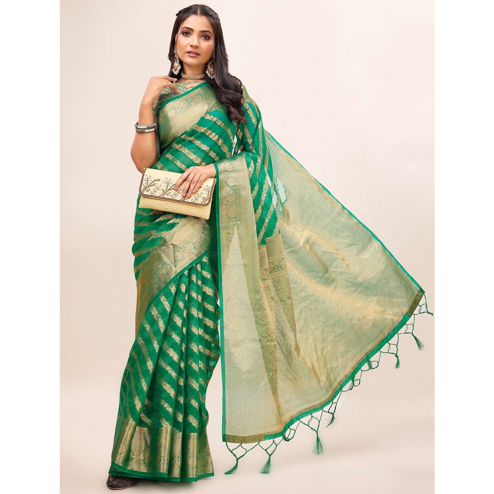 Green Woven Organza Saree With Tassels