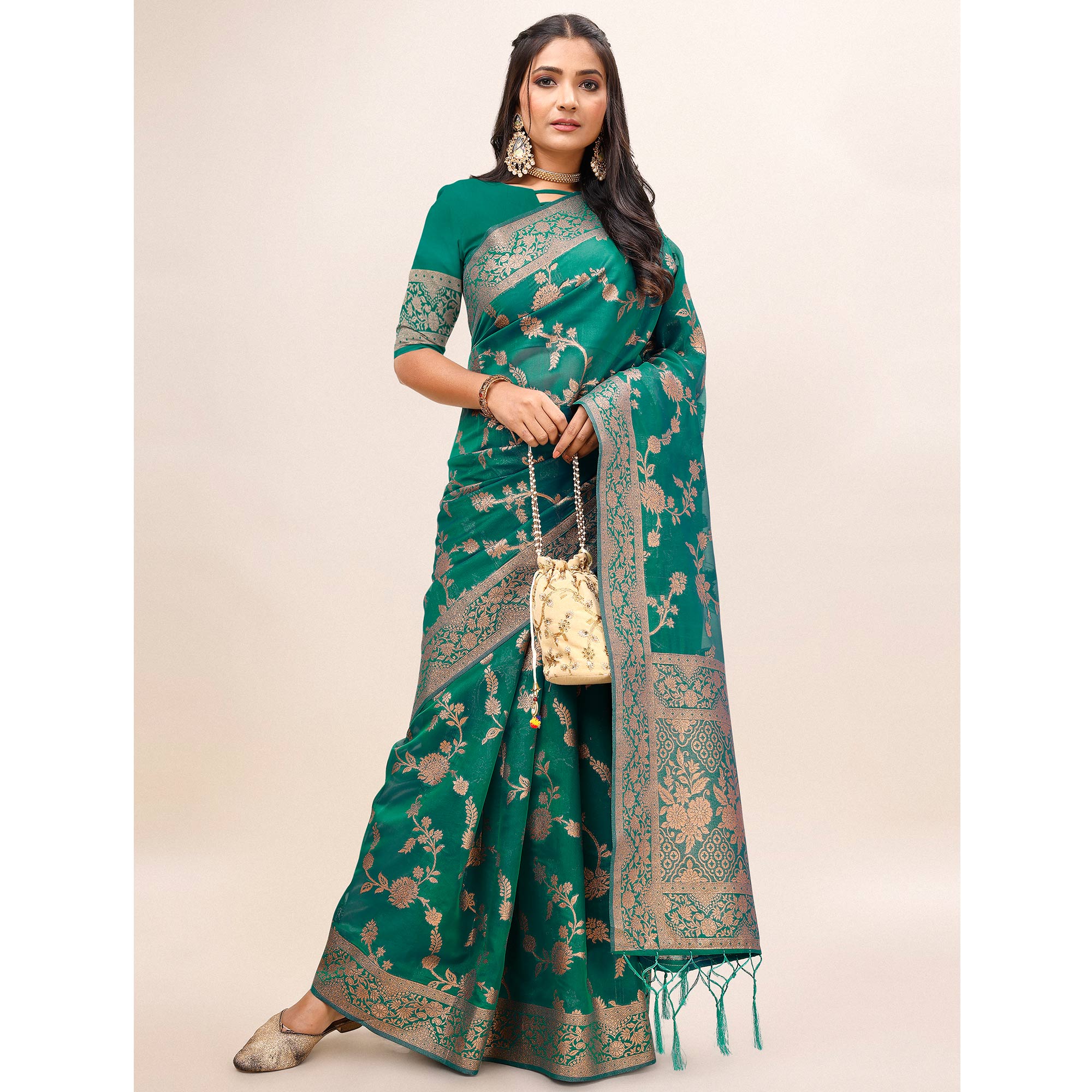 Green Woven Organza Saree With Tassels