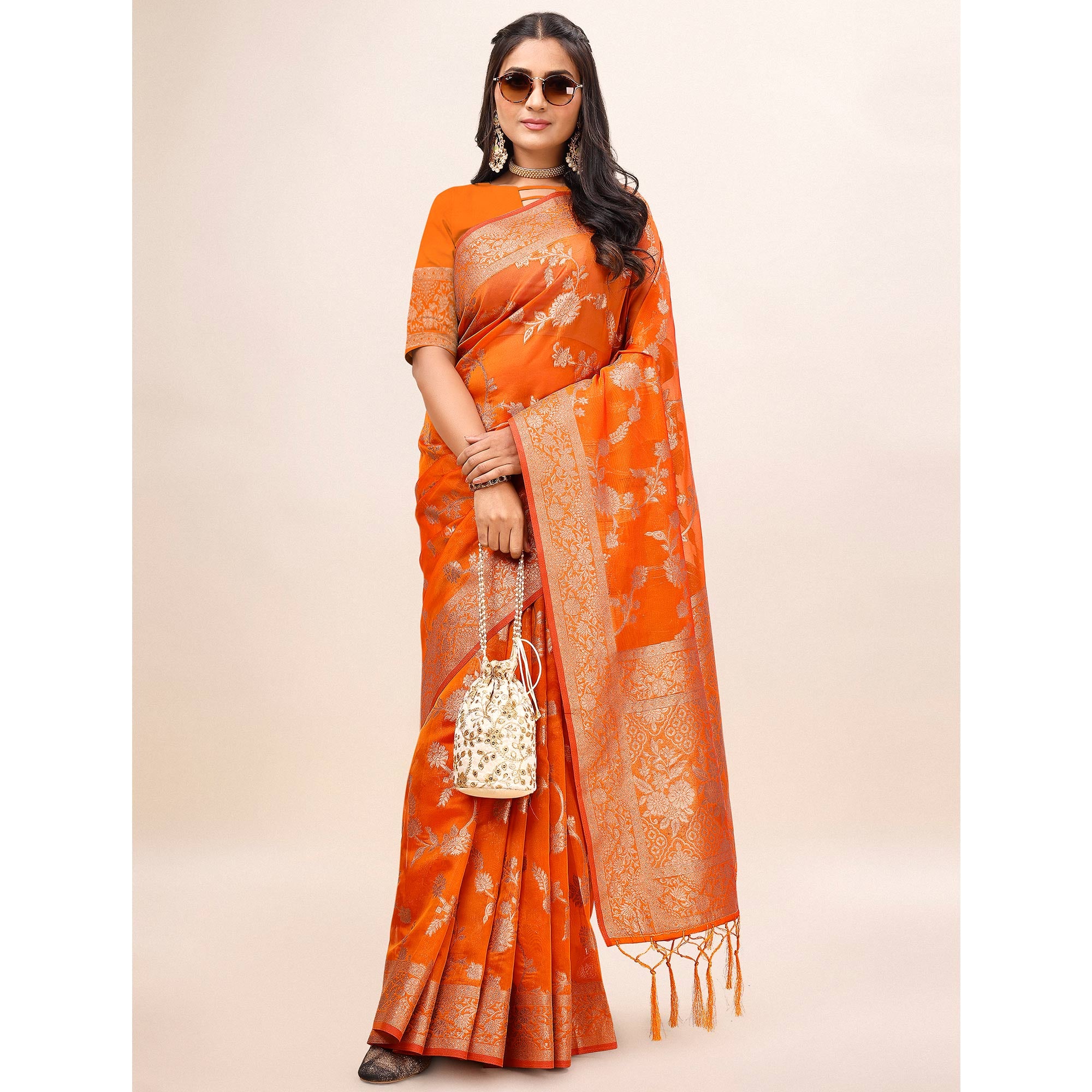 Orange Woven Organza Saree With Tassels