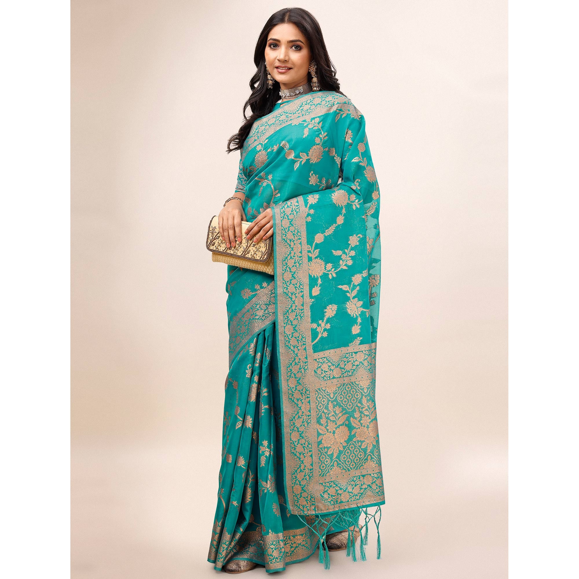 Rama Green Woven Organza Saree With Tassels