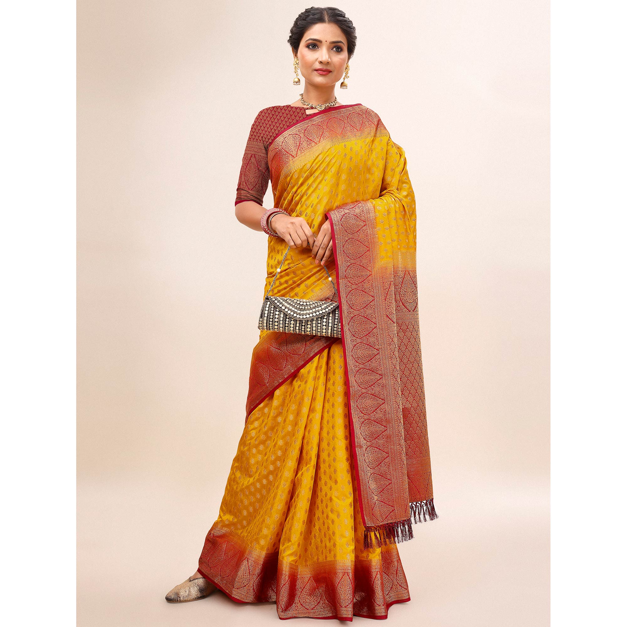 Yellow Woven Dola Silk Saree With Tassels