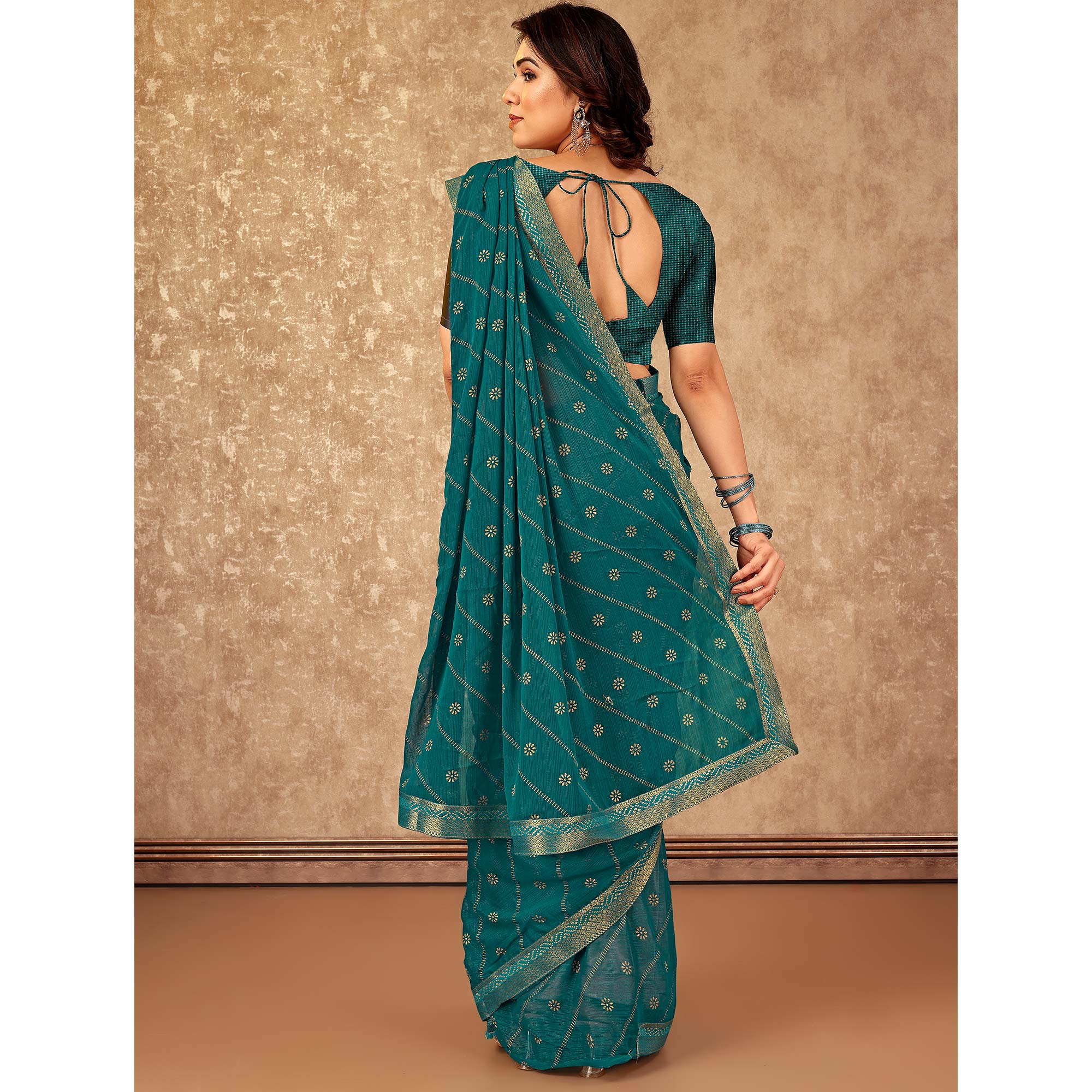 Teal Floral Foil Printed Chiffon Saree With Lace Border