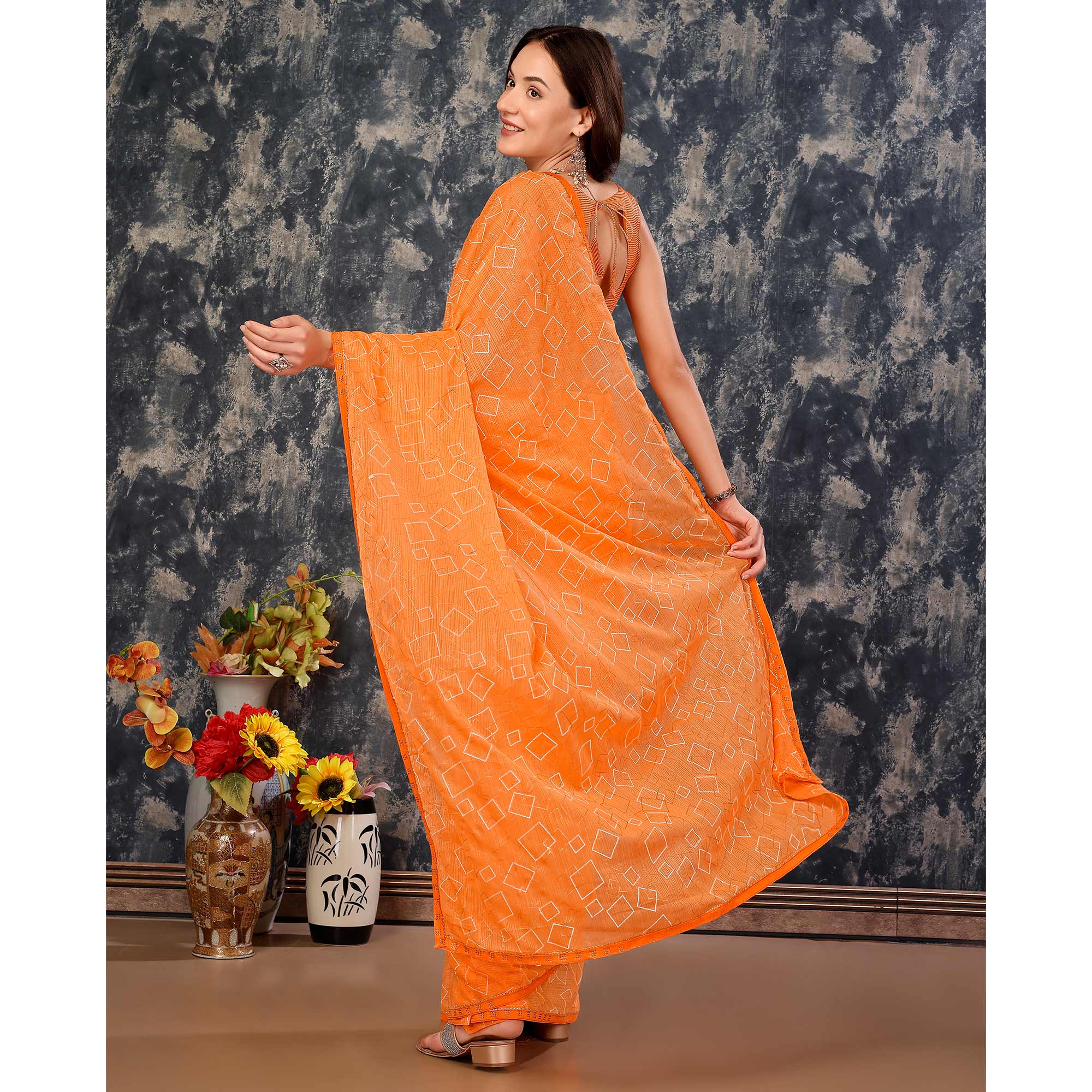 Orange Printed With Zari Work Chiffon Saree With Lace Border