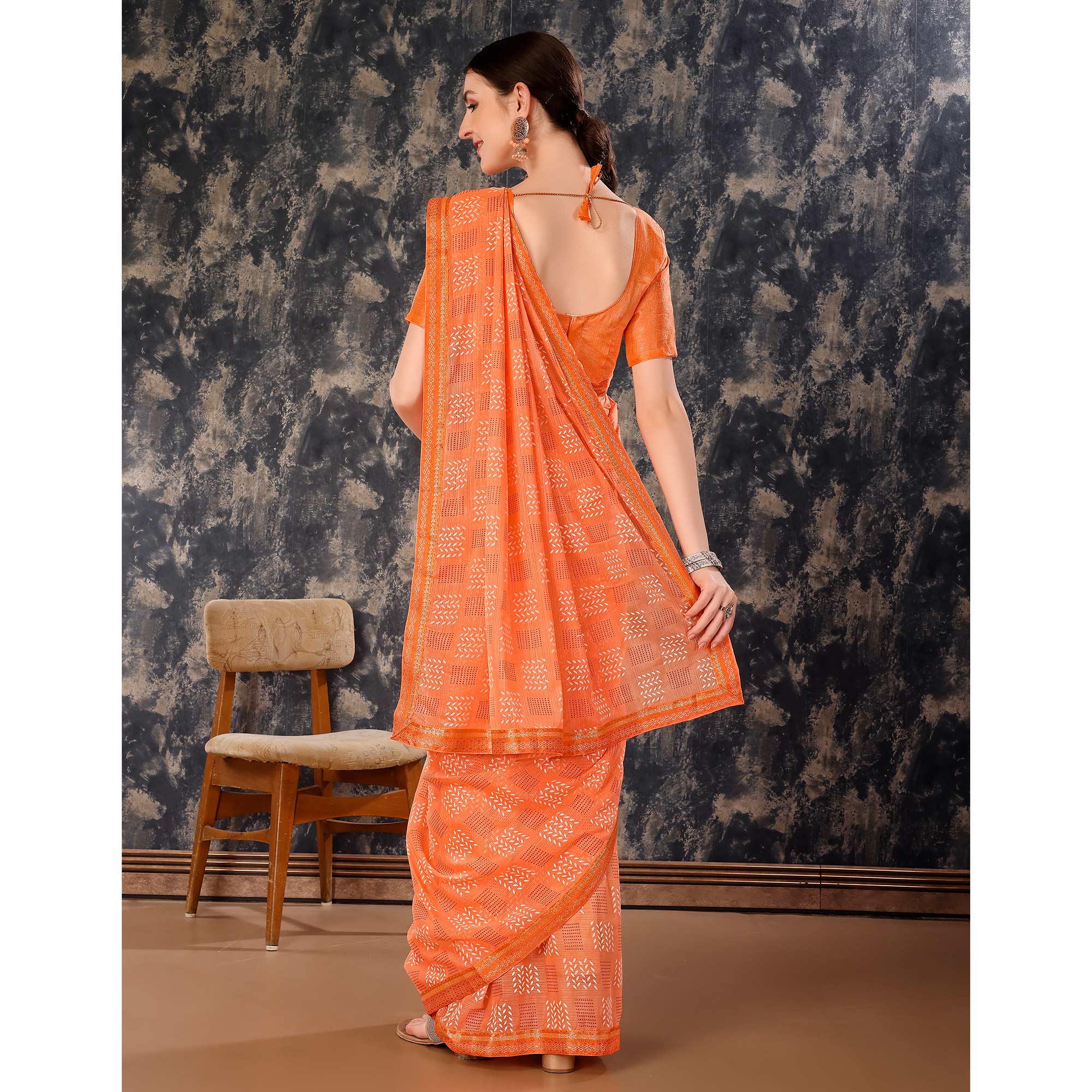 Light Orange Printed Chiffon Saree With Lace Border