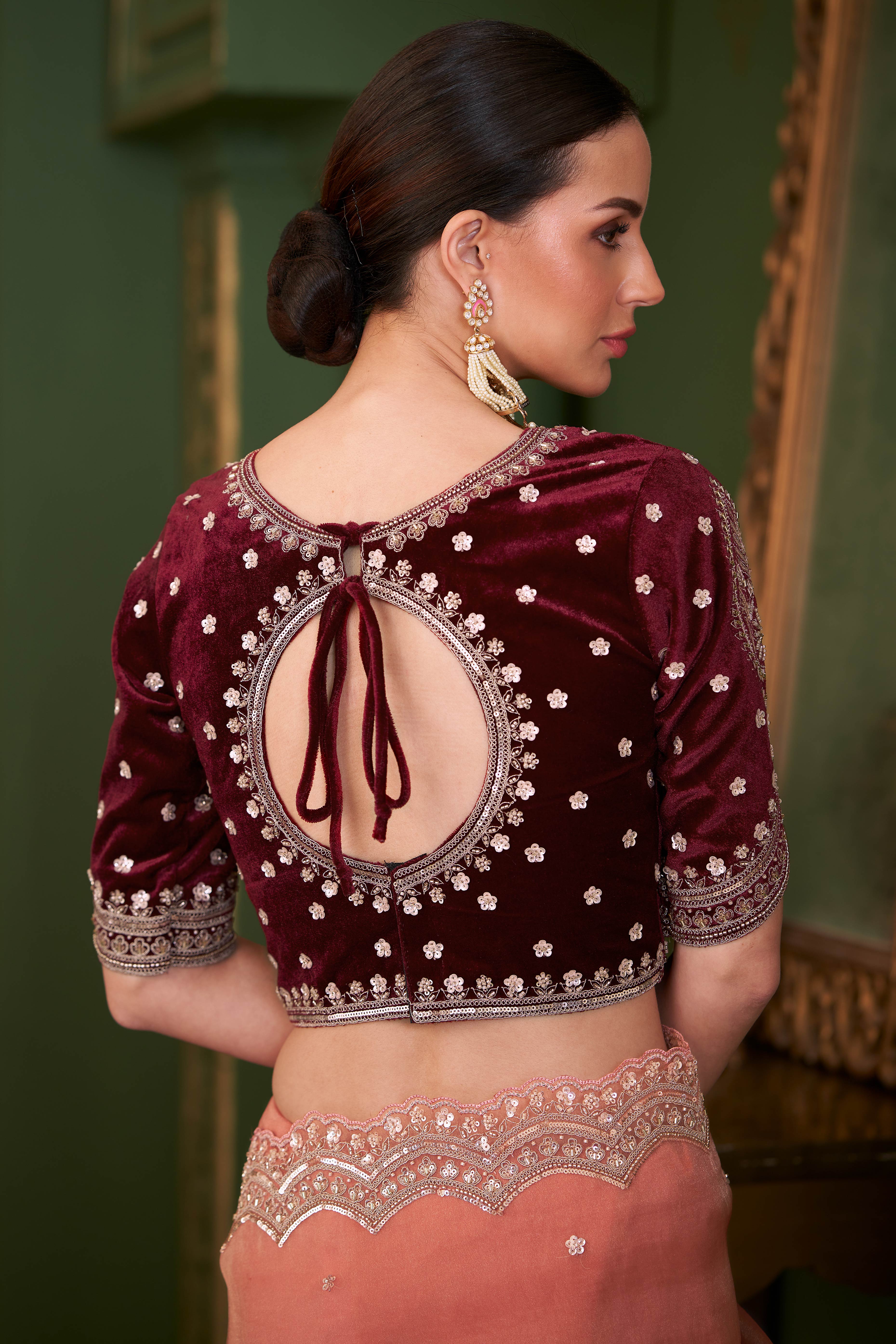 Charming Peach Georgette Saree Adorned With Floral Cording Sequins Embroidery & Cutwork Border