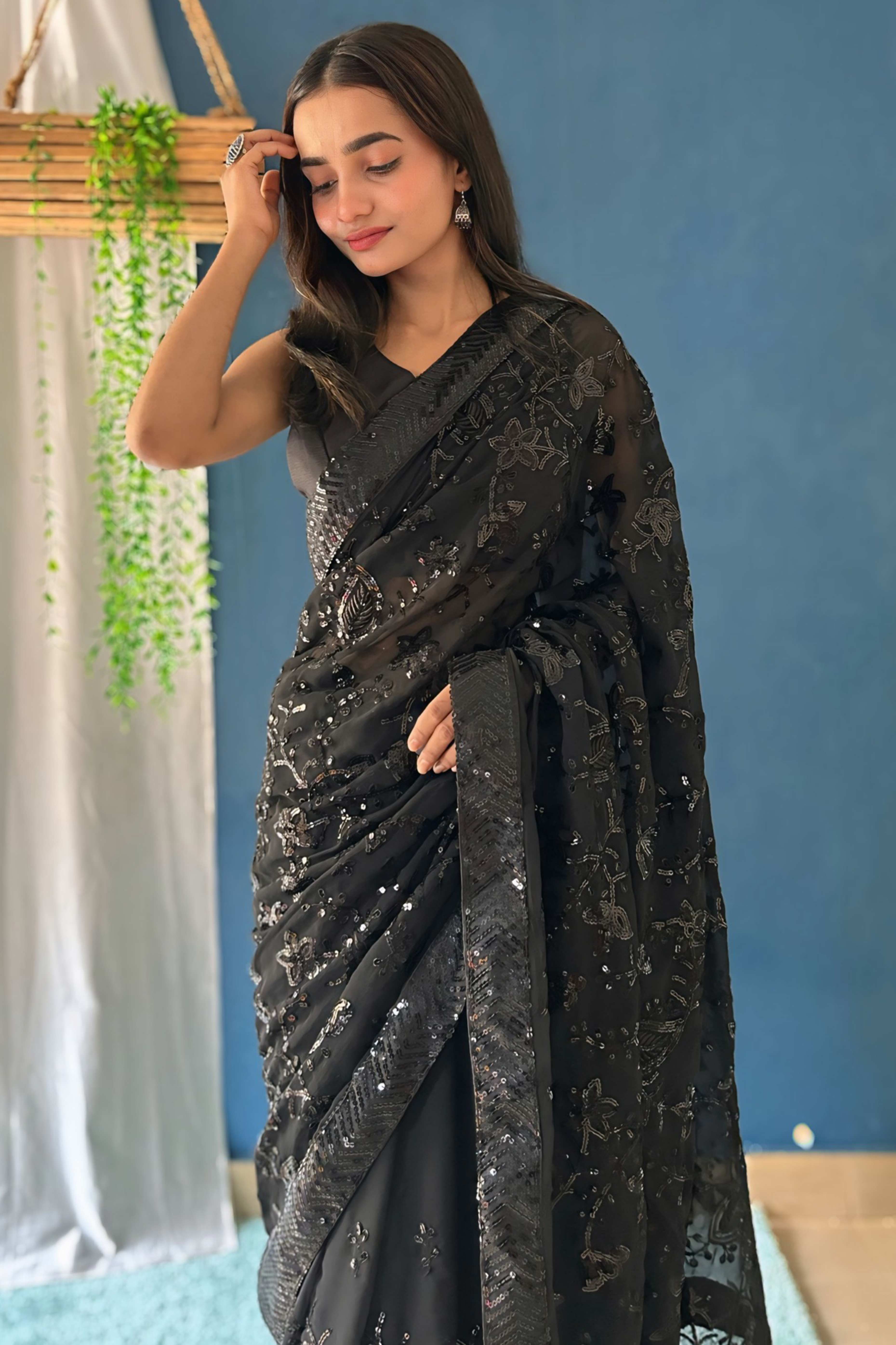Black Sequins Embellished Georgette Saree with Delicate Embroidery and Sheer Grace