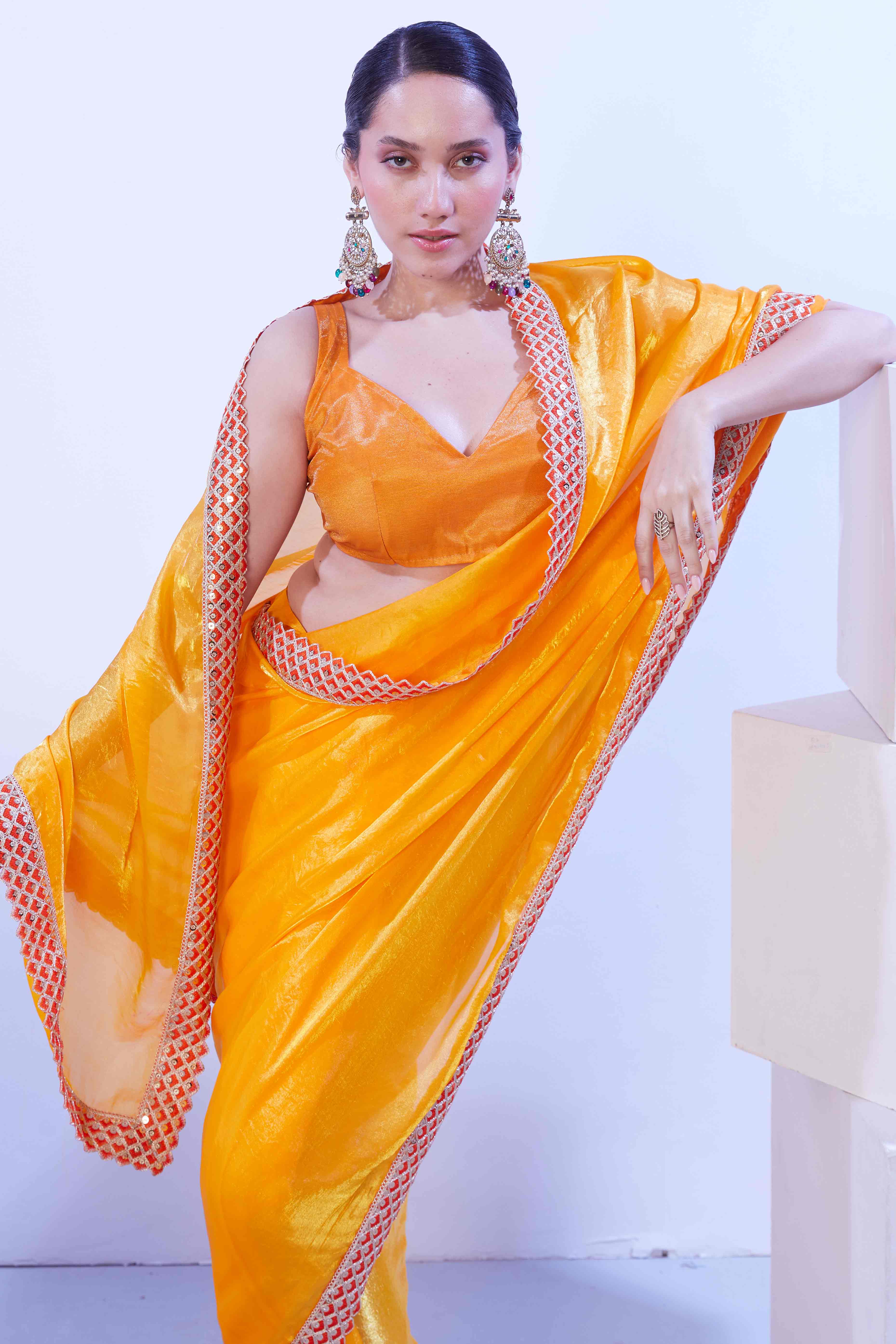 Bright Orange Satin Solid Embroidered Saree Adorned with Beads & Stones
