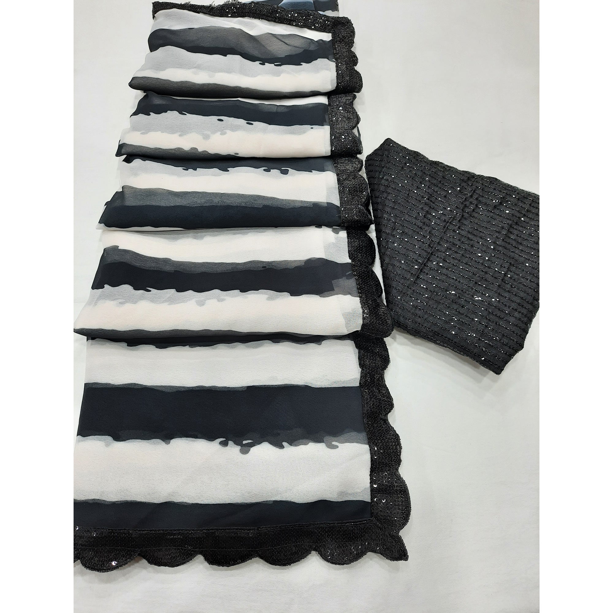 Black & White Printed Georgette Saree With Sequins Border