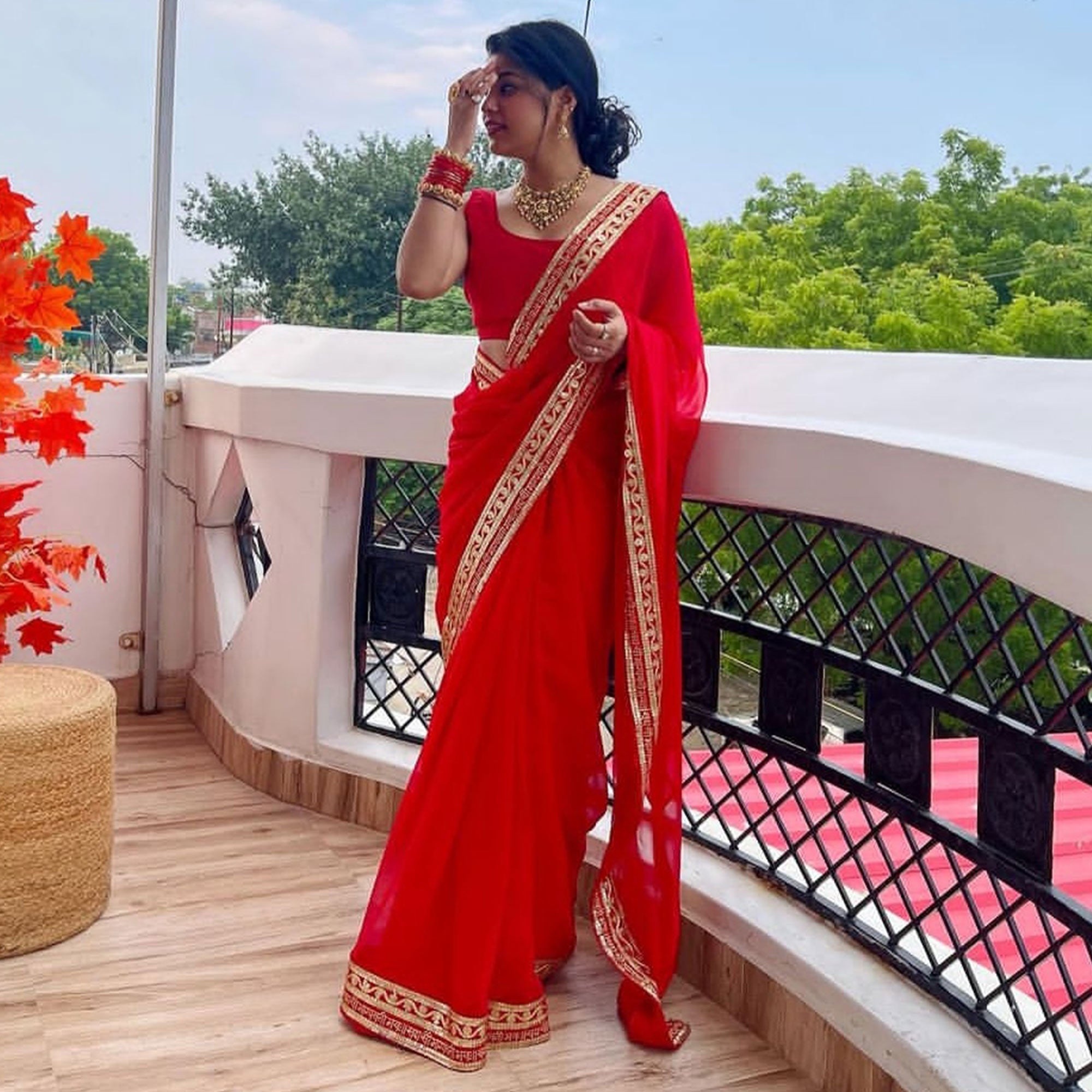 Red Solid With Embroidered Border Georgette Saree