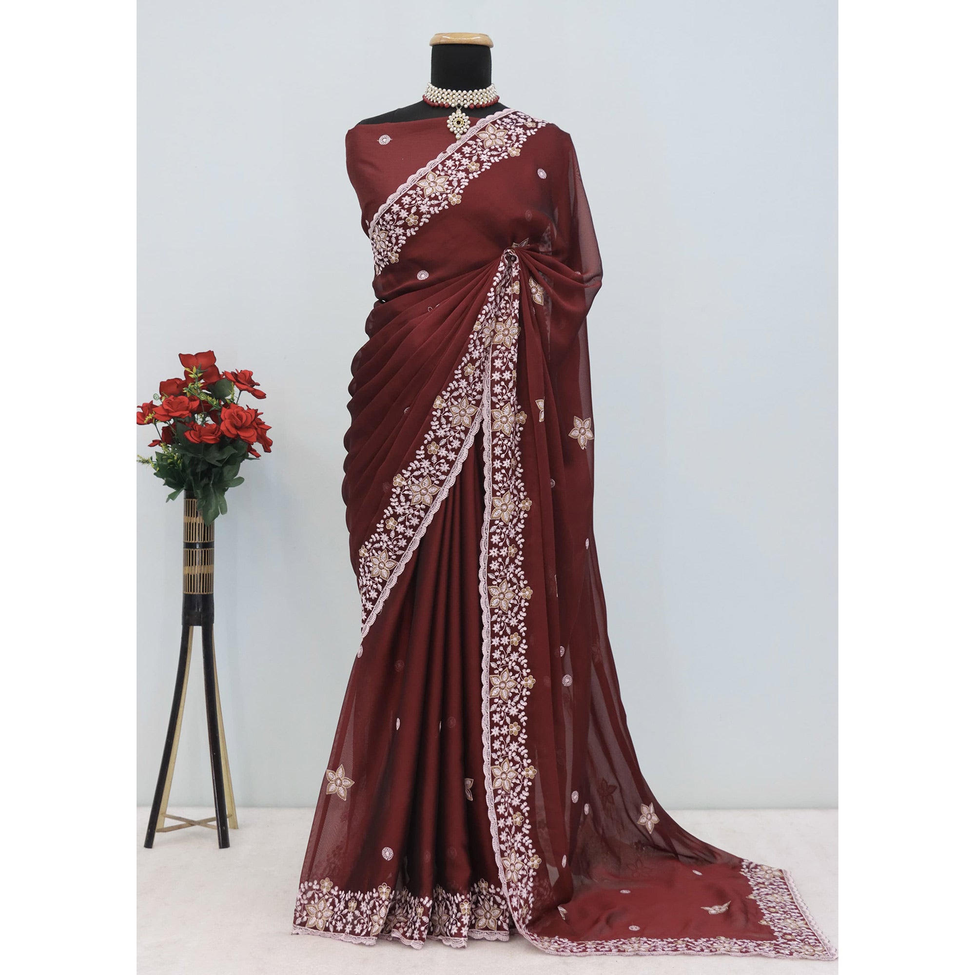 Maroon Designer Art Silk Saree Enhanced with Fine Floral Embroidery Work