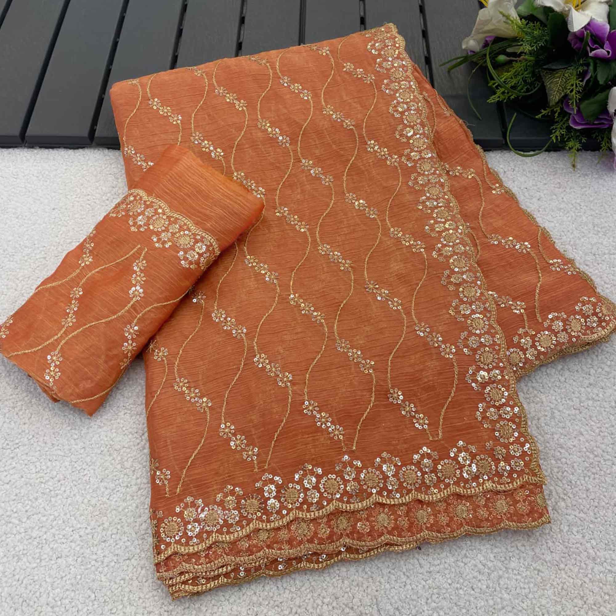Orange Partywear Organza Chiffon Silk Saree Highlighted with Fine Sequins Detailing