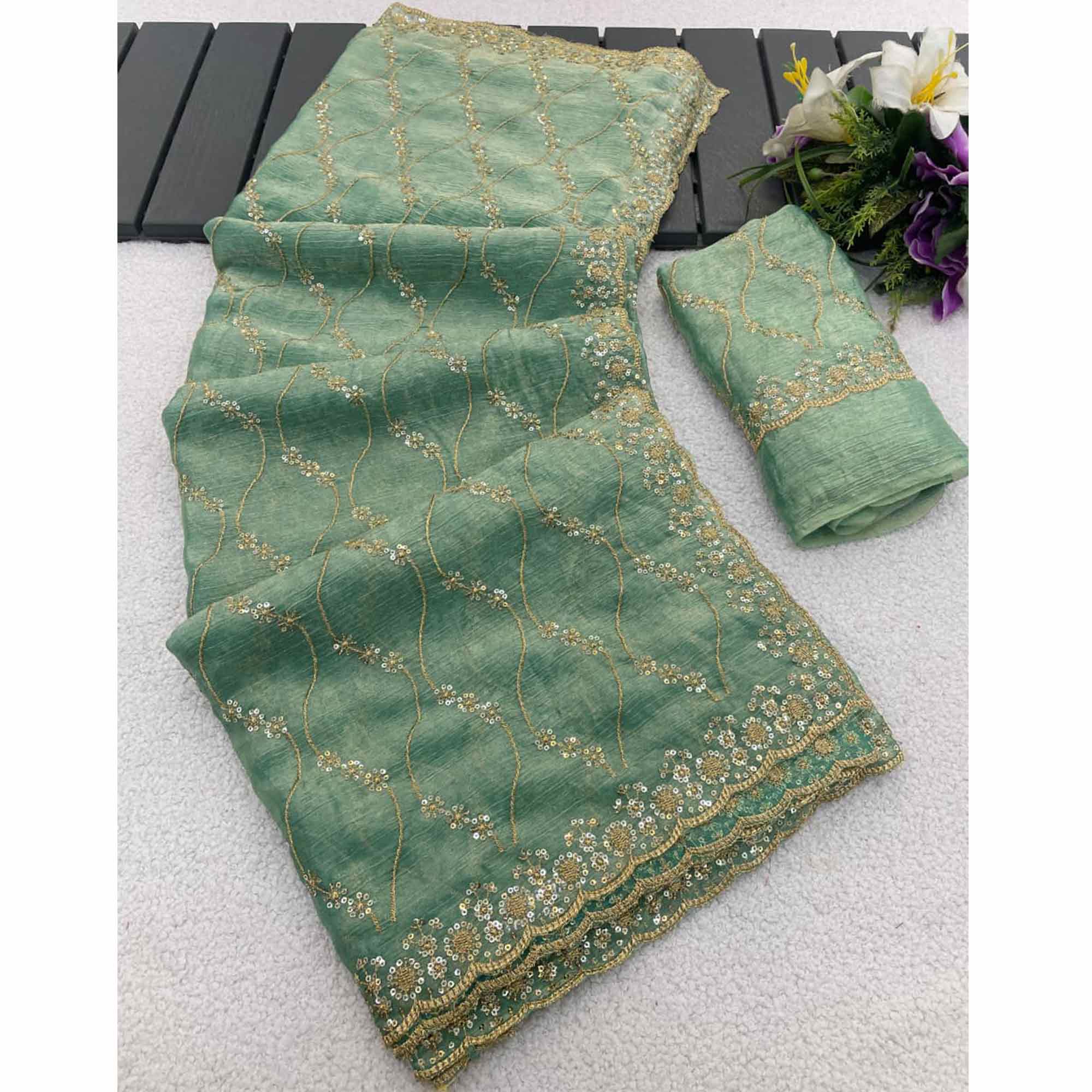 Sea Green Partywear Organza Chiffon Silk Saree Highlighted with Fine Sequins Detailing